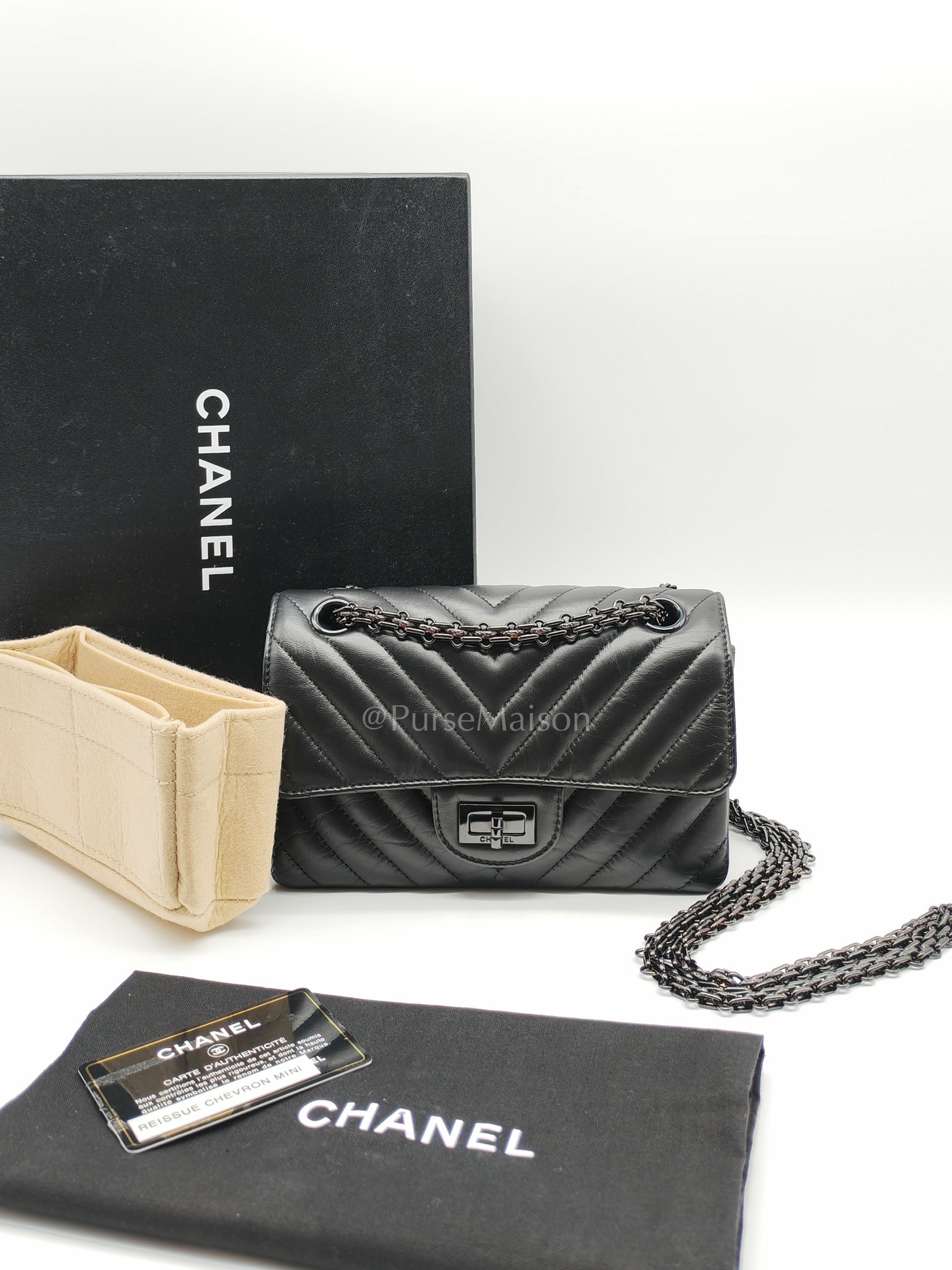 20A Mini Reissue Mademoiselle Flap 2.55 in Chevron Aged Calfskin Leather So Black Hardware (Series 30) | Purse Maison Luxury Bags Shop