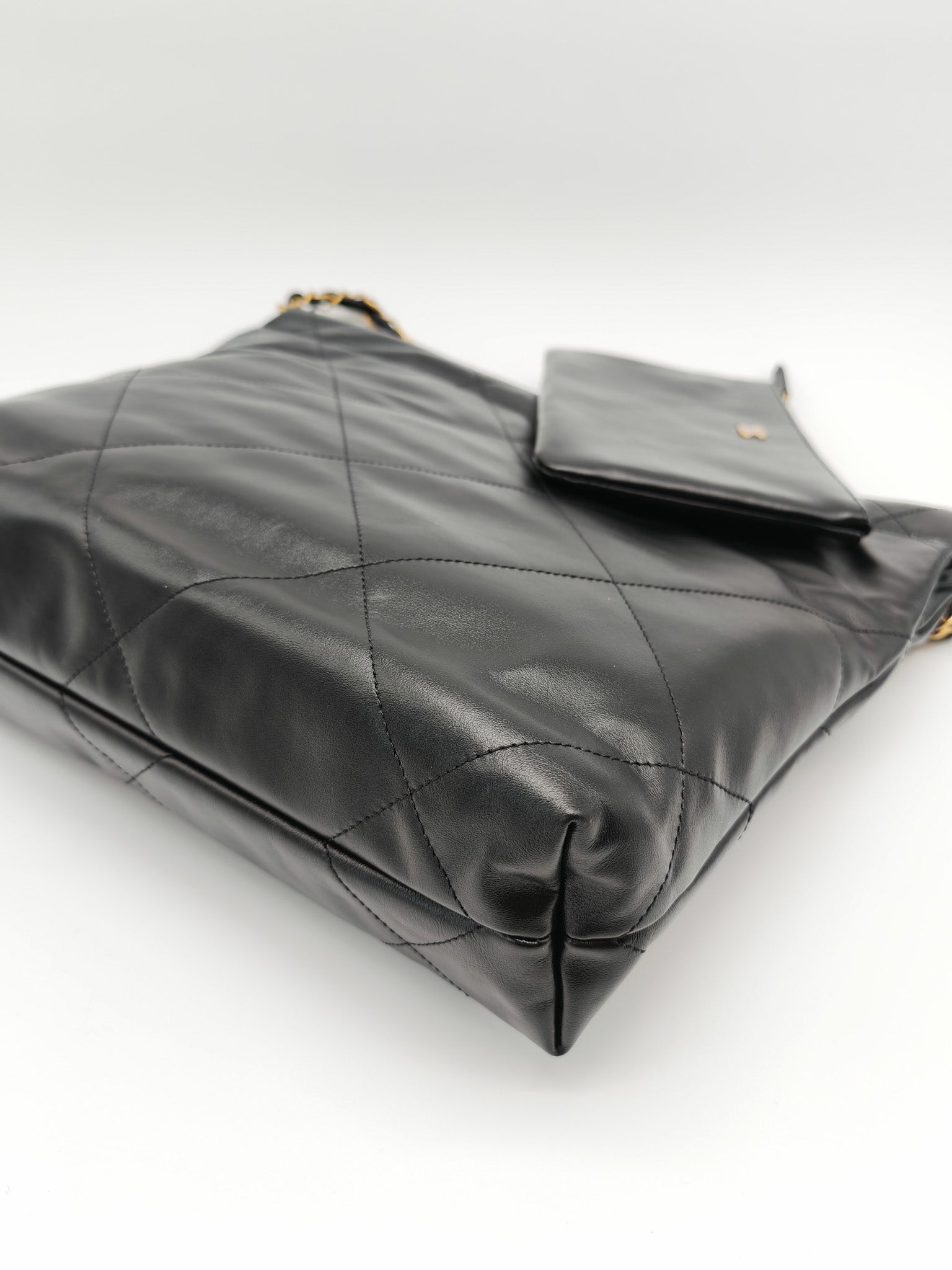 22 Small in Black Quilted Shiny Calfskin Leather and Aged Gold Hardware (Microchip) | Purse Maison Luxury Bags Shop