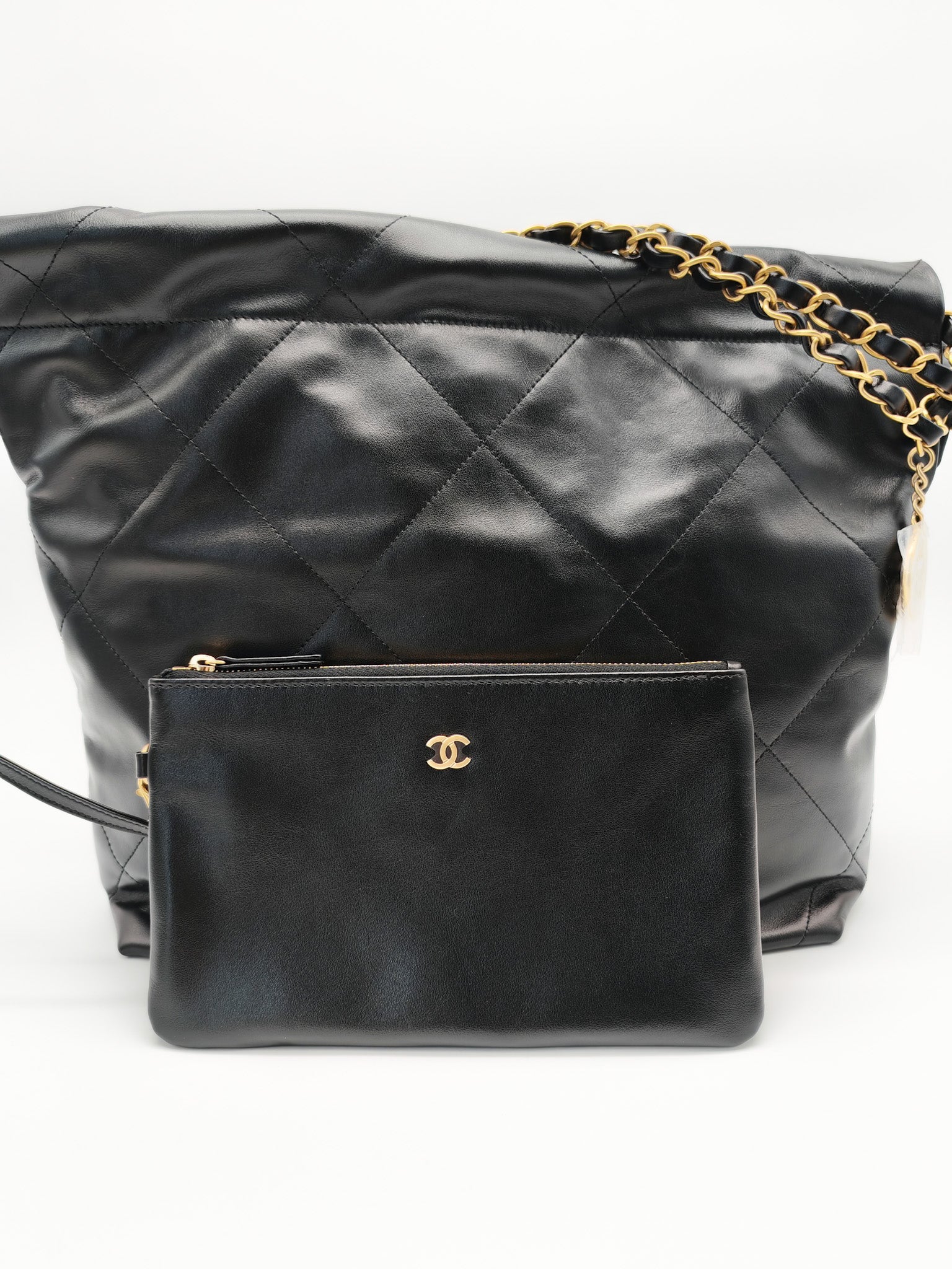 22 Small in Black Quilted Shiny Calfskin Leather and Aged Gold Hardware (Microchip) | Purse Maison Luxury Bags Shop