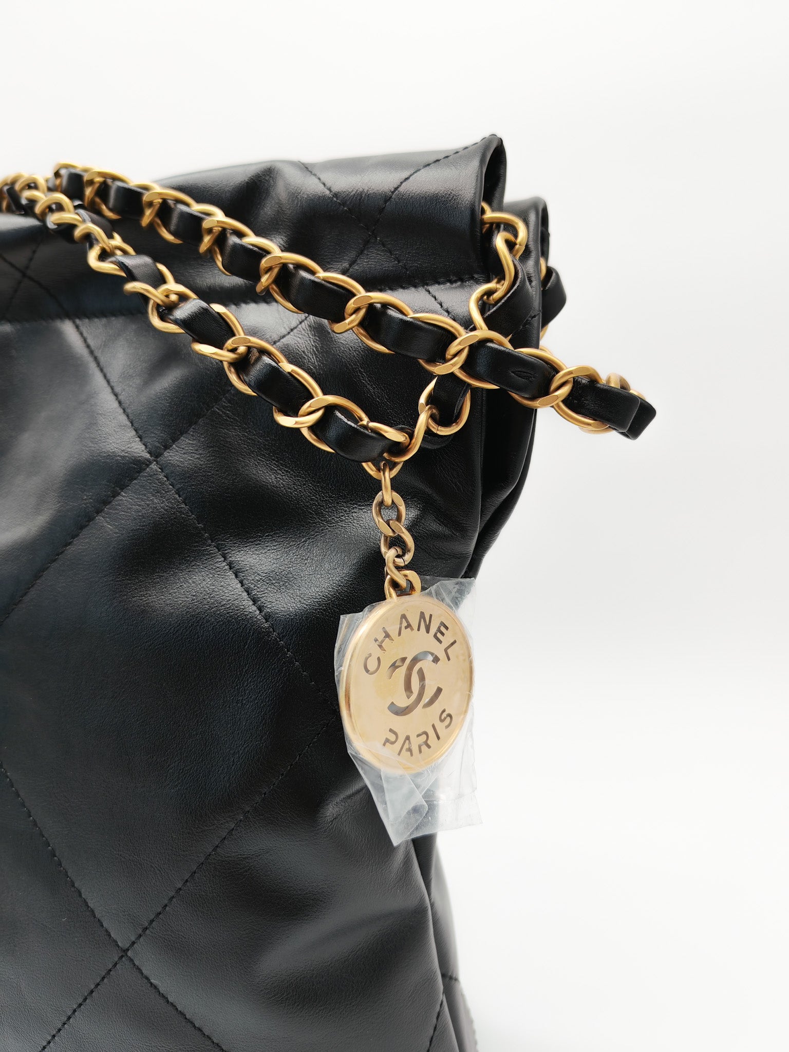 22 Small in Black Quilted Shiny Calfskin Leather and Aged Gold Hardware (Microchip) | Purse Maison Luxury Bags Shop