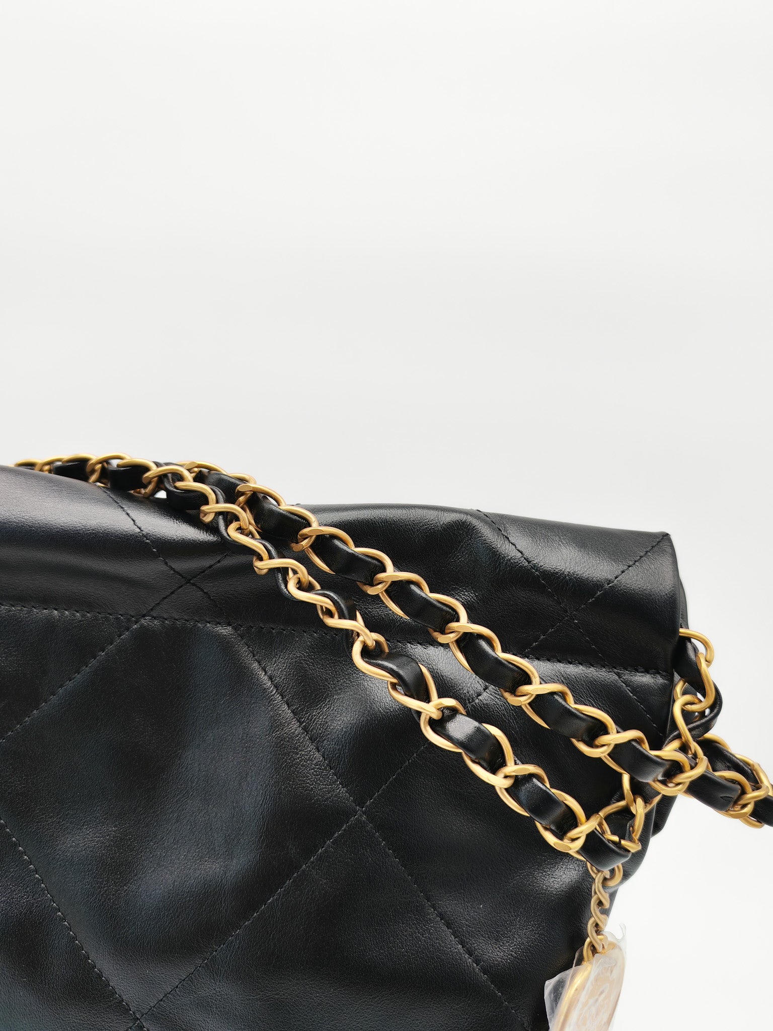 22 Small in Black Quilted Shiny Calfskin Leather and Aged Gold Hardware (Microchip) | Purse Maison Luxury Bags Shop