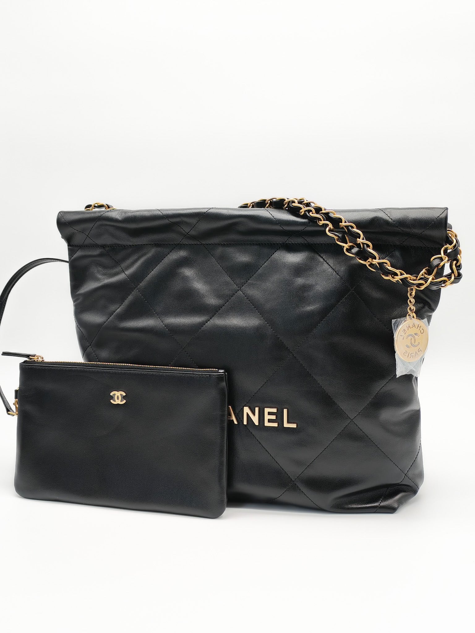 22 Small in Black Quilted Shiny Calfskin Leather and Aged Gold Hardware (Microchip) | Purse Maison Luxury Bags Shop