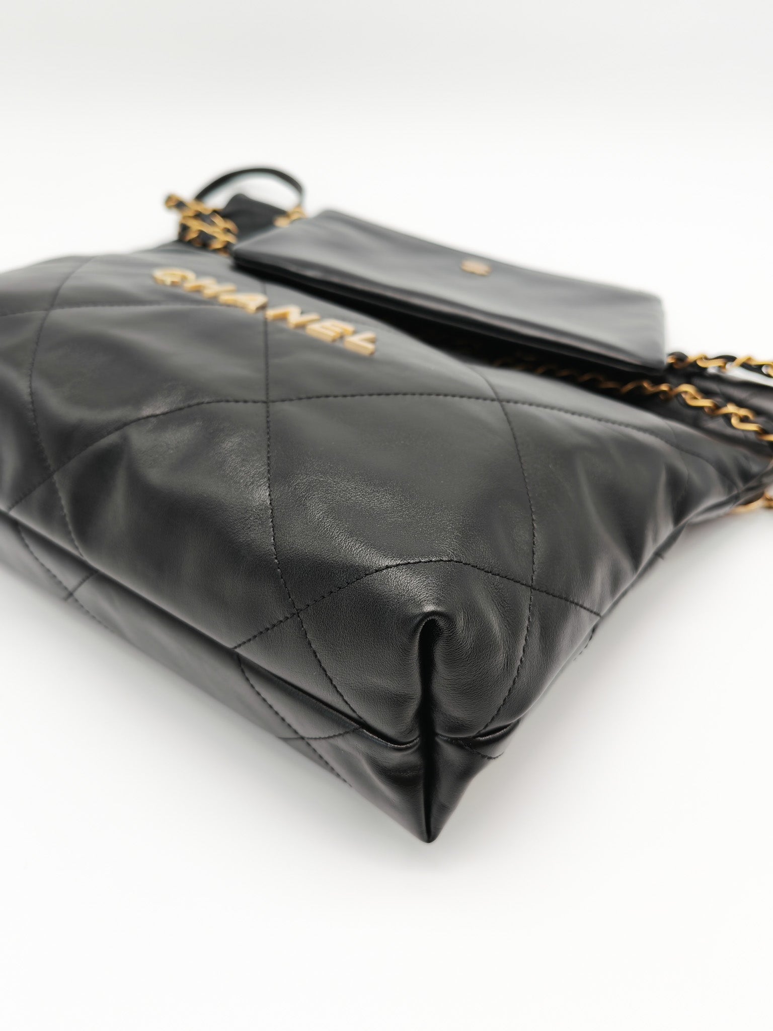 22 Small in Black Quilted Shiny Calfskin Leather and Aged Gold Hardware (Microchip) | Purse Maison Luxury Bags Shop