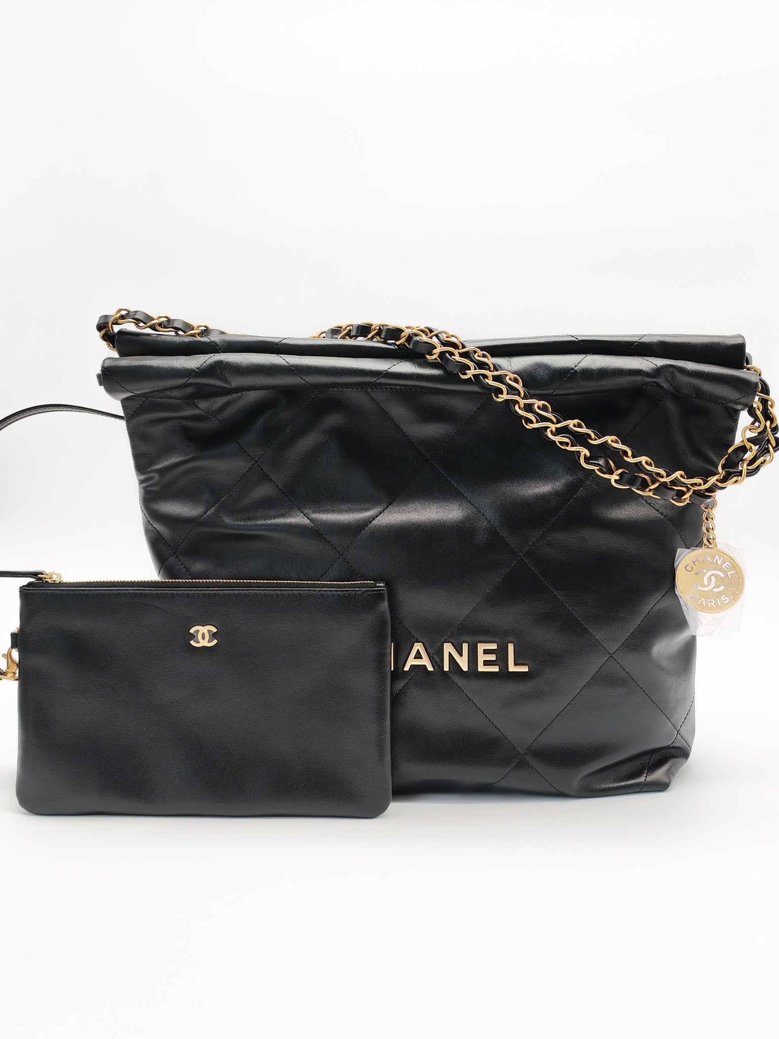 22 Small in Black Quilted Shiny Calfskin Leather and Aged Gold Hardware (Microchip) | Purse Maison Luxury Bags Shop