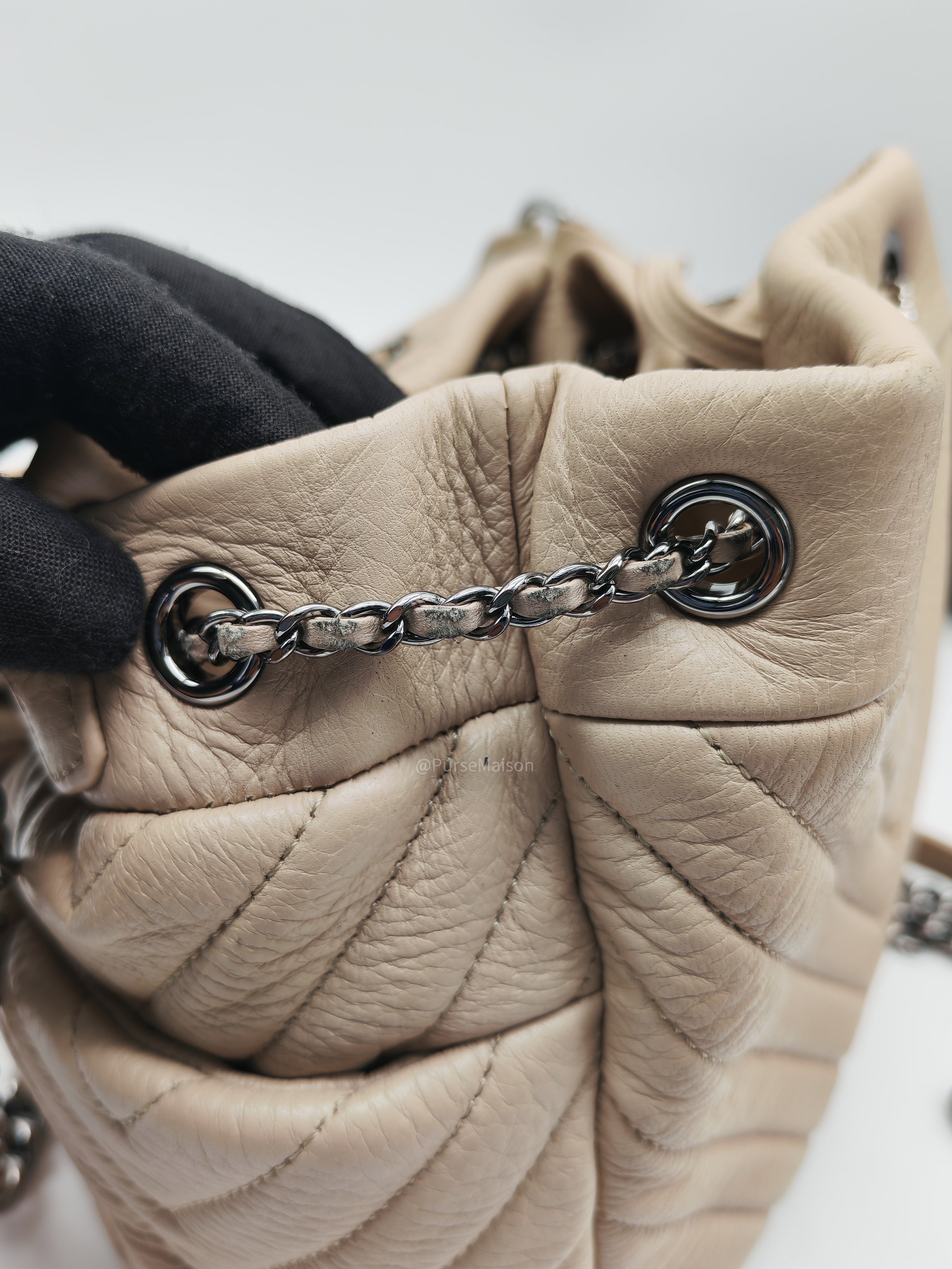 Chanel Chevron Drawstring Bucket Bag in Beige Calfskin Leather and Silver Hardware Series 23