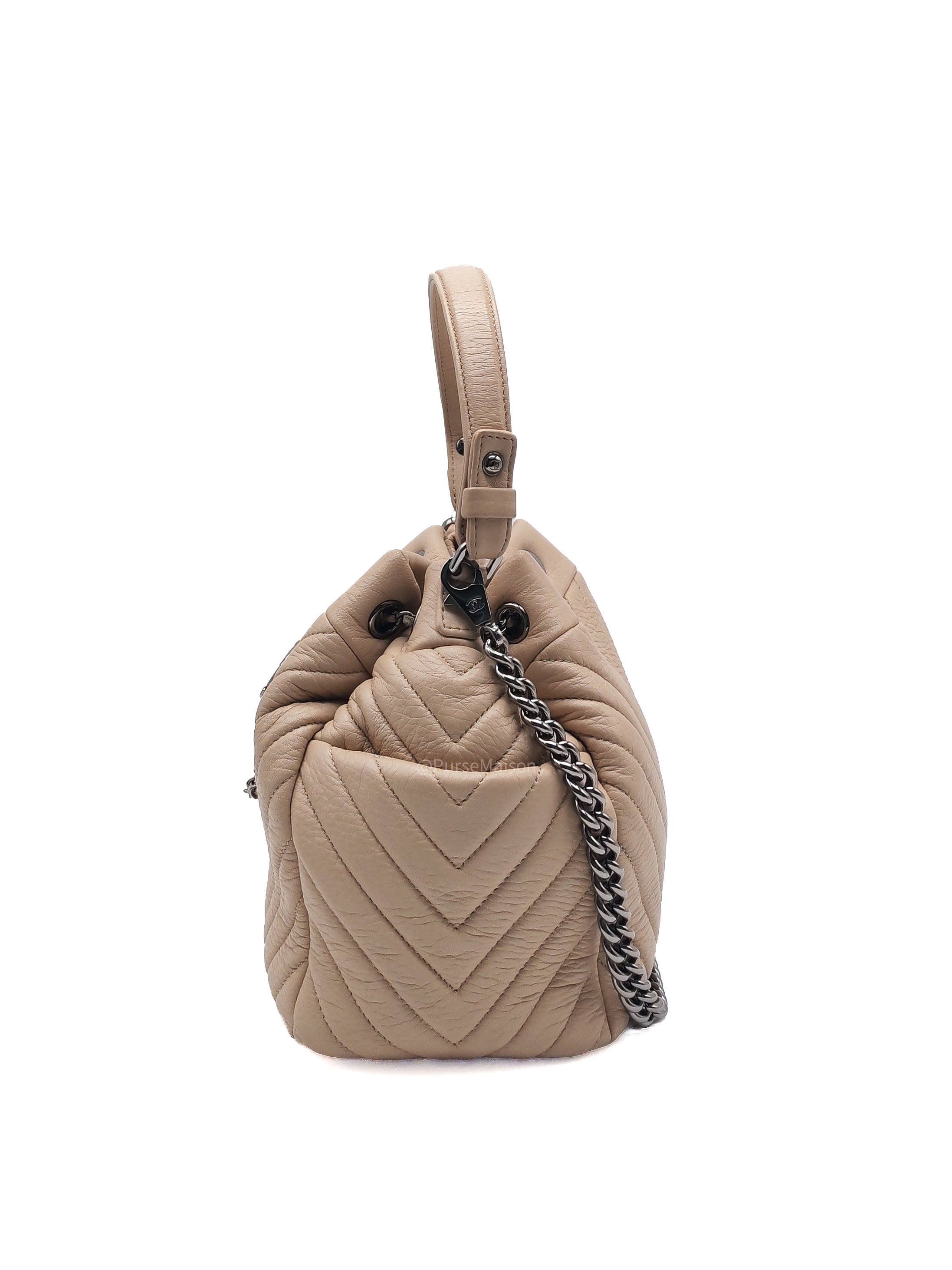 Chanel Chevron Drawstring Bucket Bag in Beige Calfskin Leather and Silver Hardware Series 23