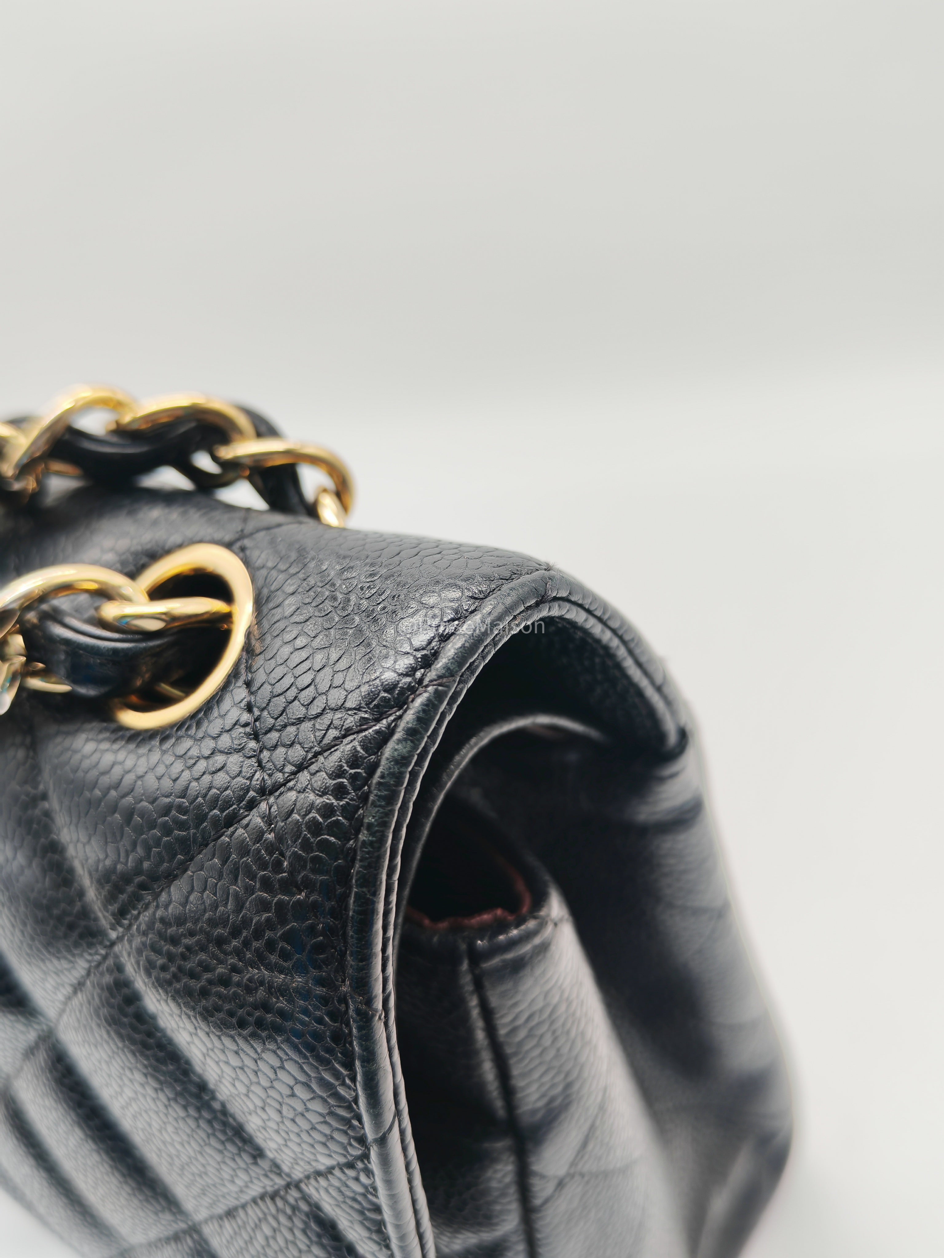 Chanel Classic Doube Flap Jumbo in Black Quilted Caviar Leather and Gold Hardware Series 16