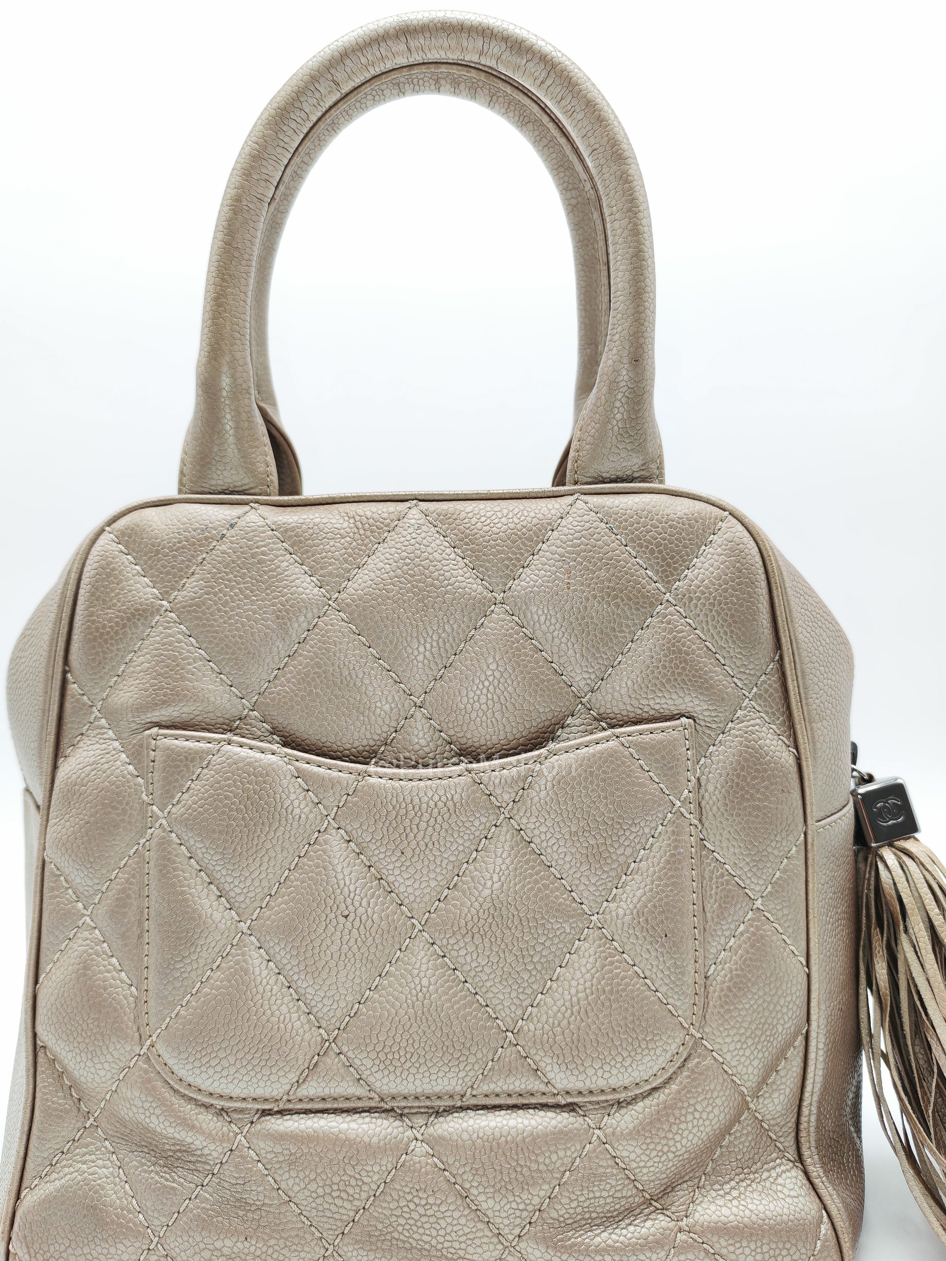 Chanel Tassel Top Handle Bag in Metallic Quilted Caviar Leather Silver Hardware (Series 9)