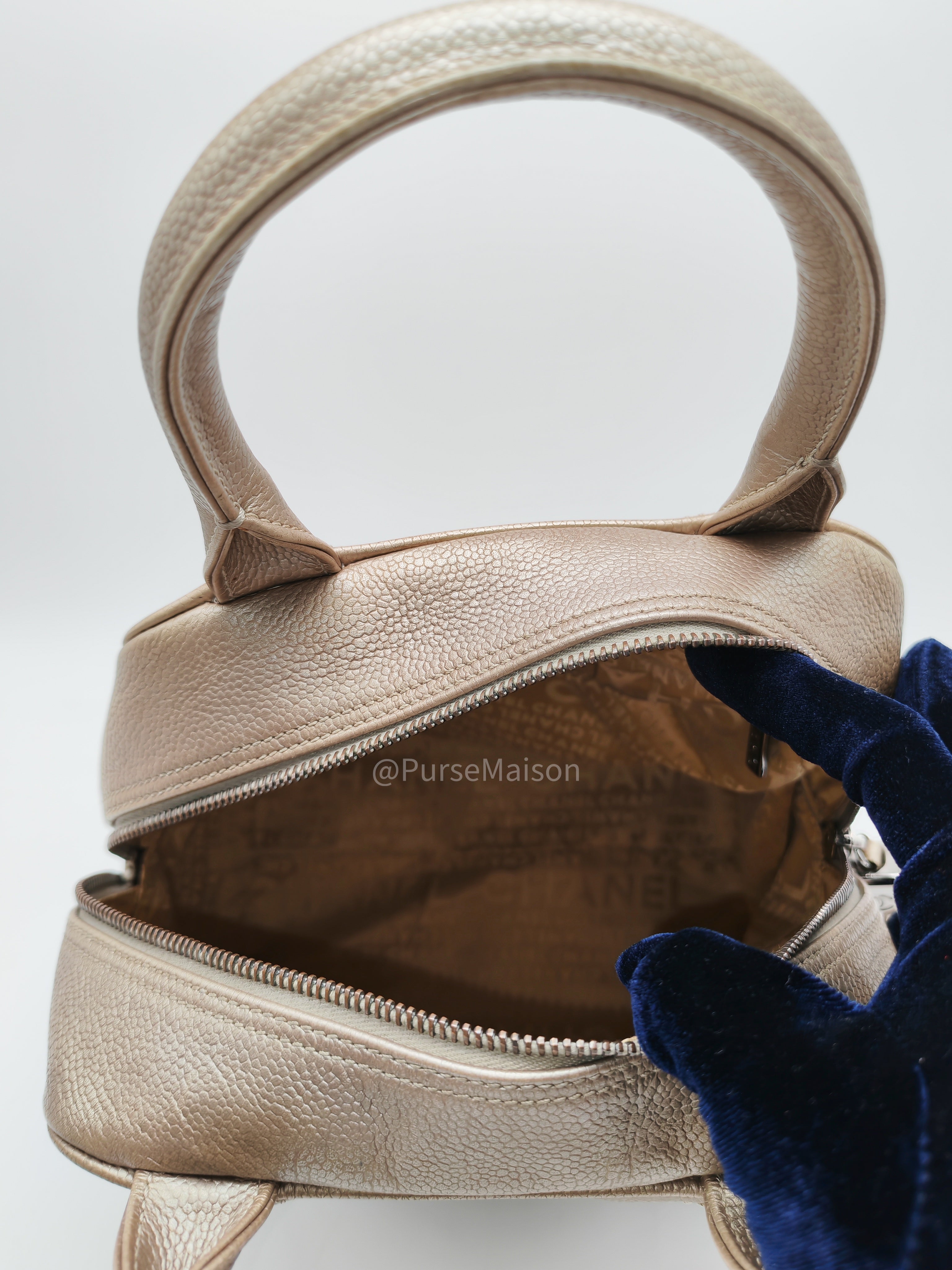 Chanel Tassel Top Handle Bag in Metallic Quilted Caviar Leather Silver Hardware (Series 9)