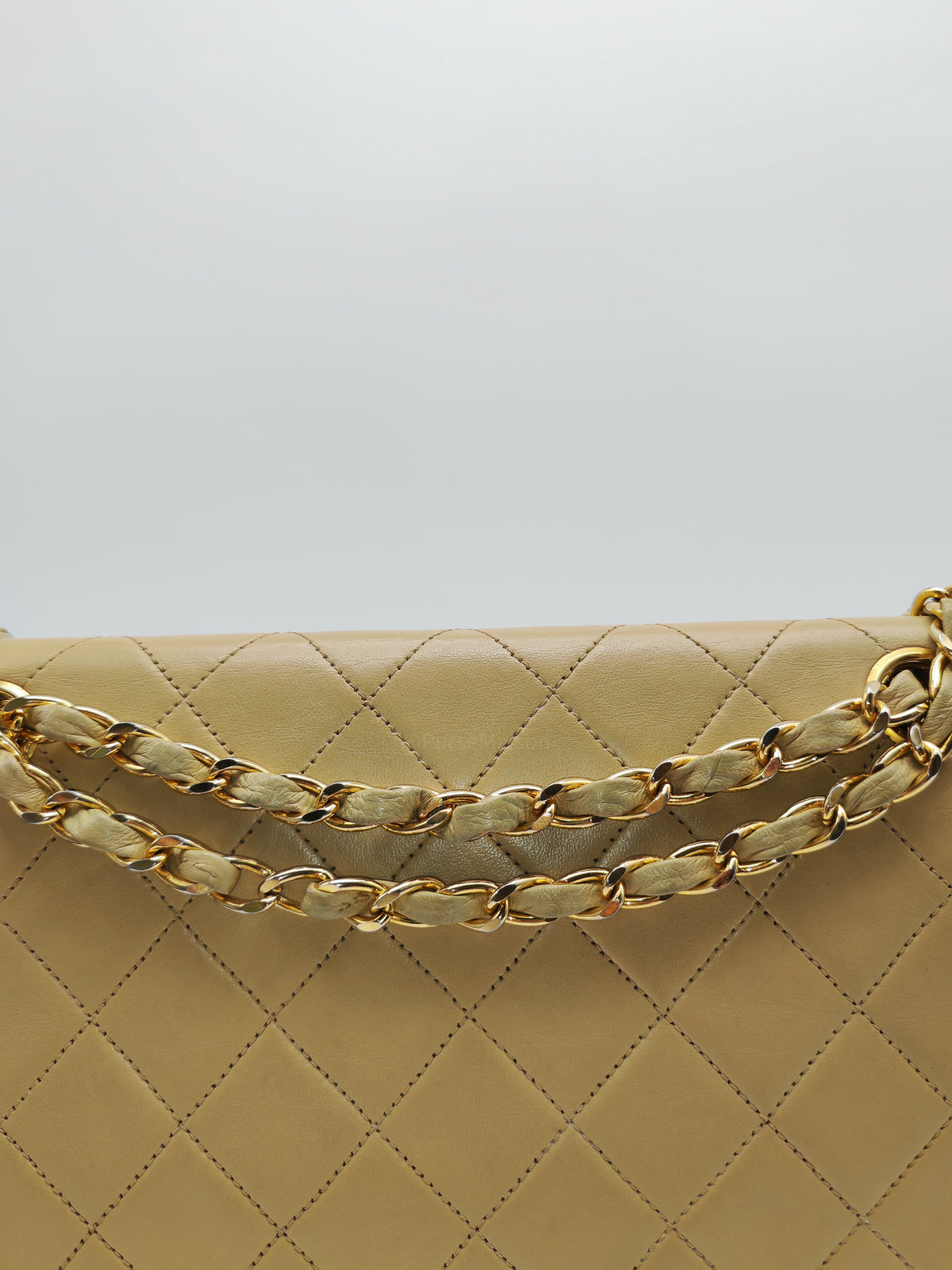 Chanel Vintage Timeless Classic Flap Bag in Beige Quilted Lambskin Leather and Gold Hardware Series 1