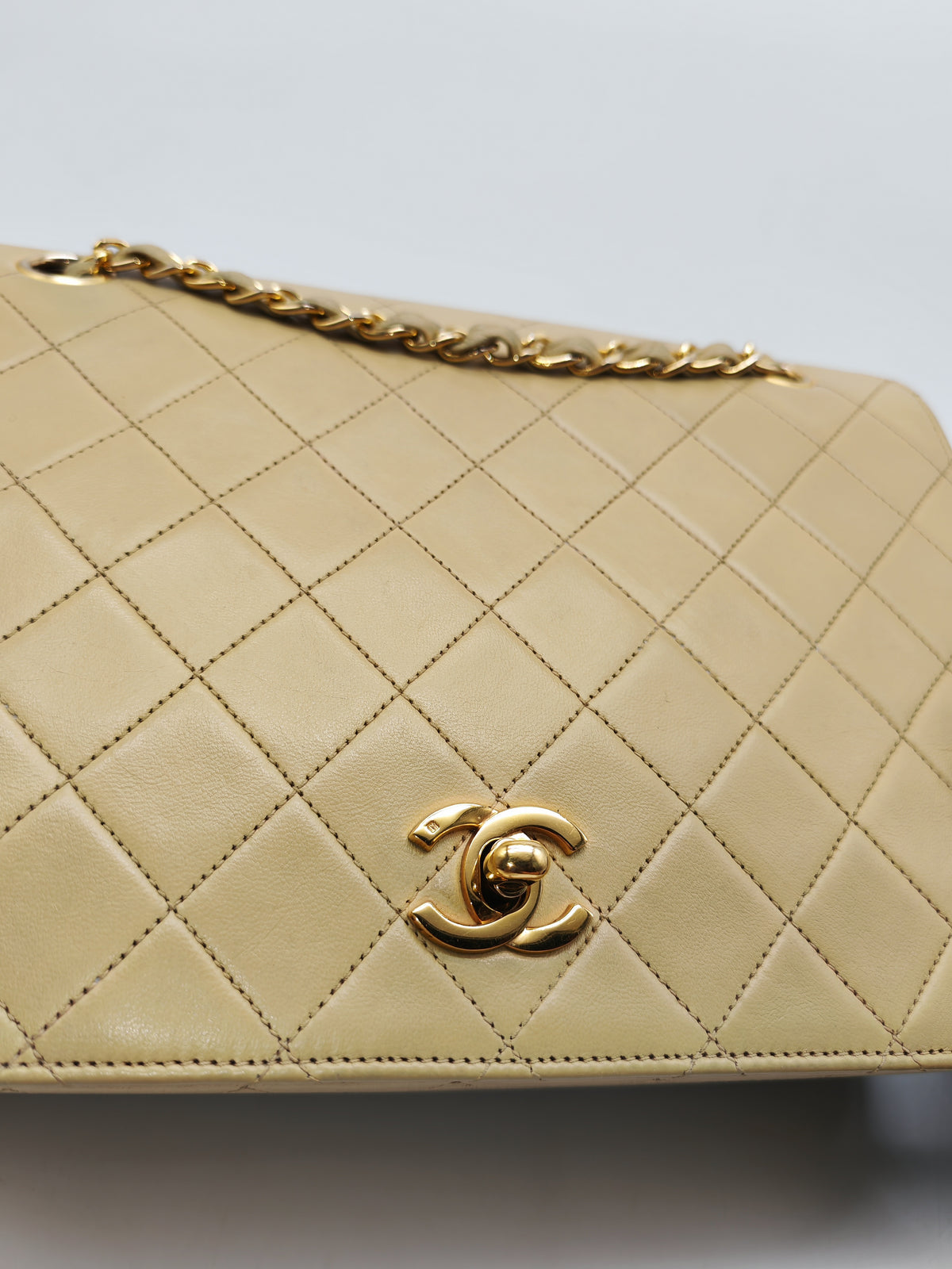 Chanel Vintage Timeless Classic Flap Bag in Beige Quilted Lambskin Leather and Gold Hardware Series 1