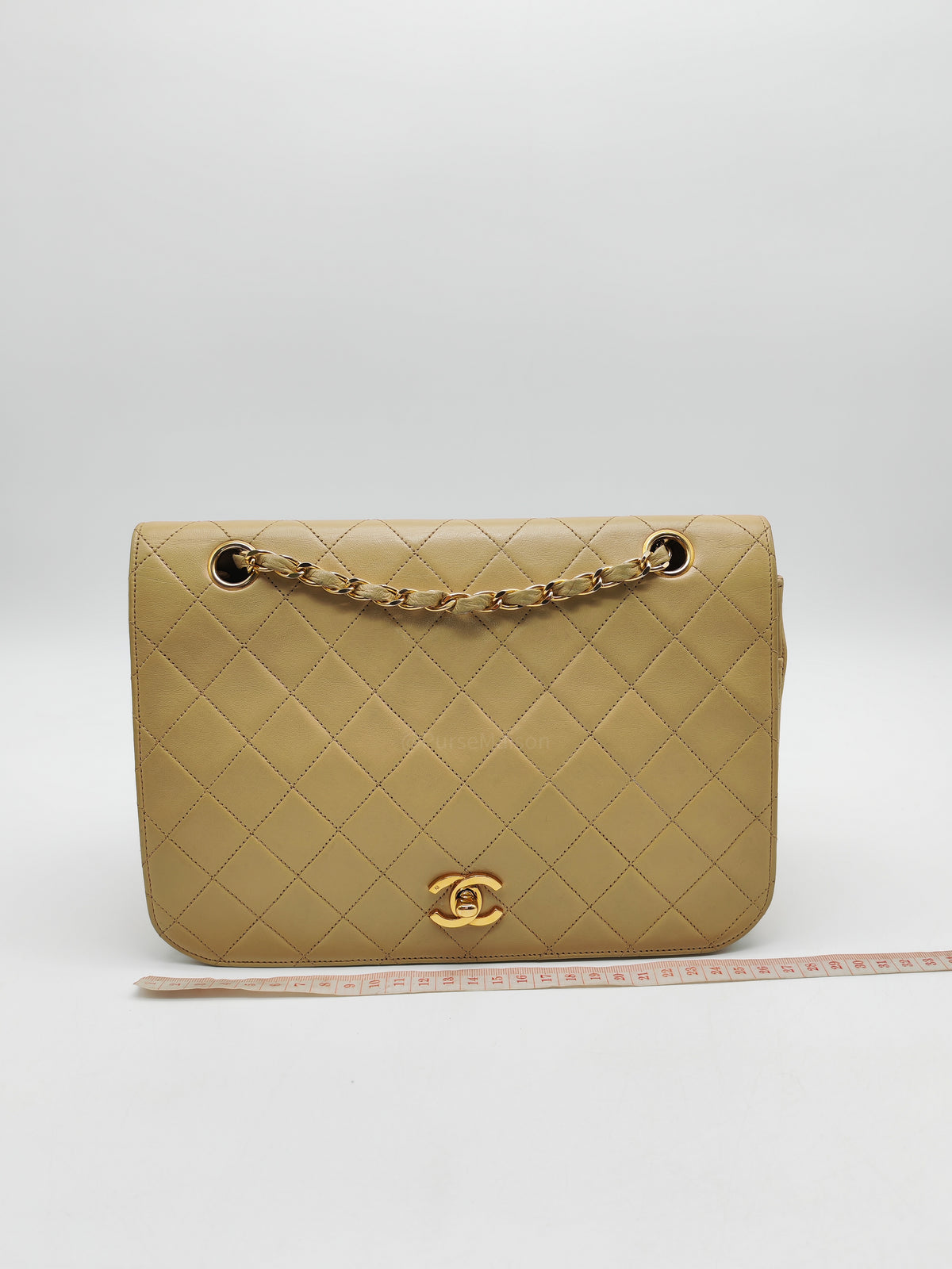 Chanel Vintage Timeless Classic Flap Bag in Beige Quilted Lambskin Leather and Gold Hardware Series 1