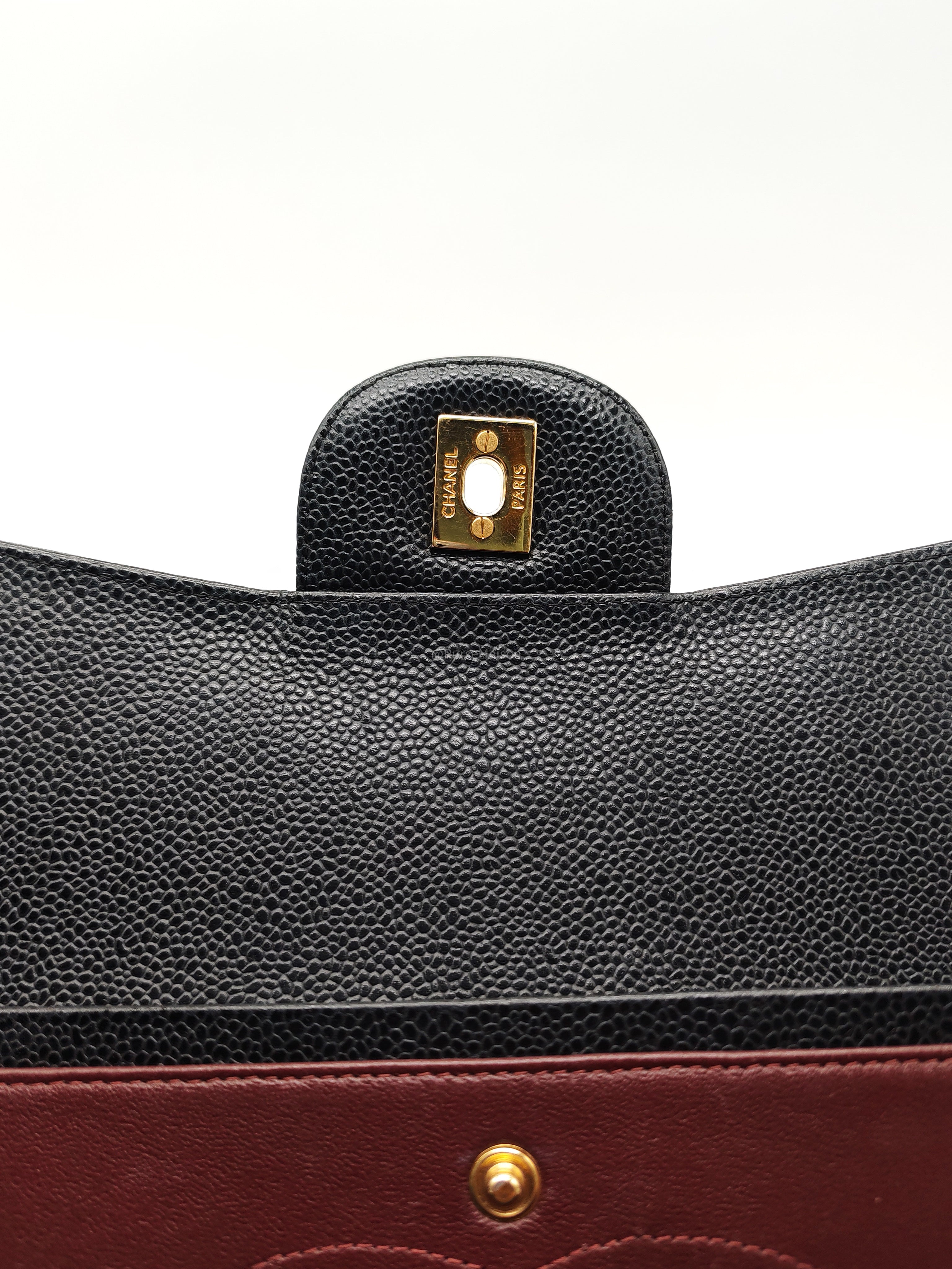 Chanel Classic Double Flap Maxi in Black Quilted Caviar Leather and Gold Hardware Series 15