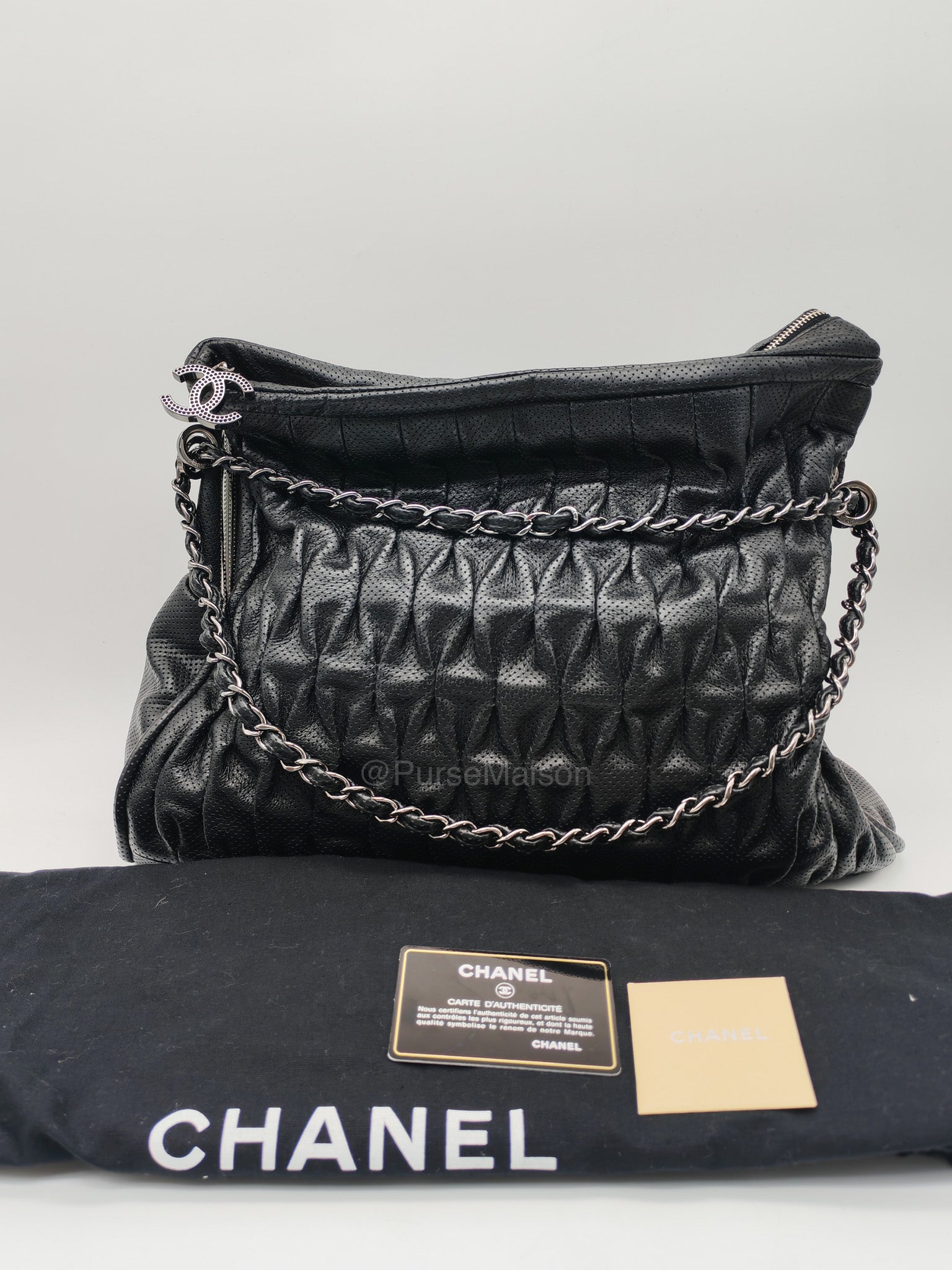 Chanel Perforated Ultimate Soft Hobo Bag in Black and Silver Hardware Series 12