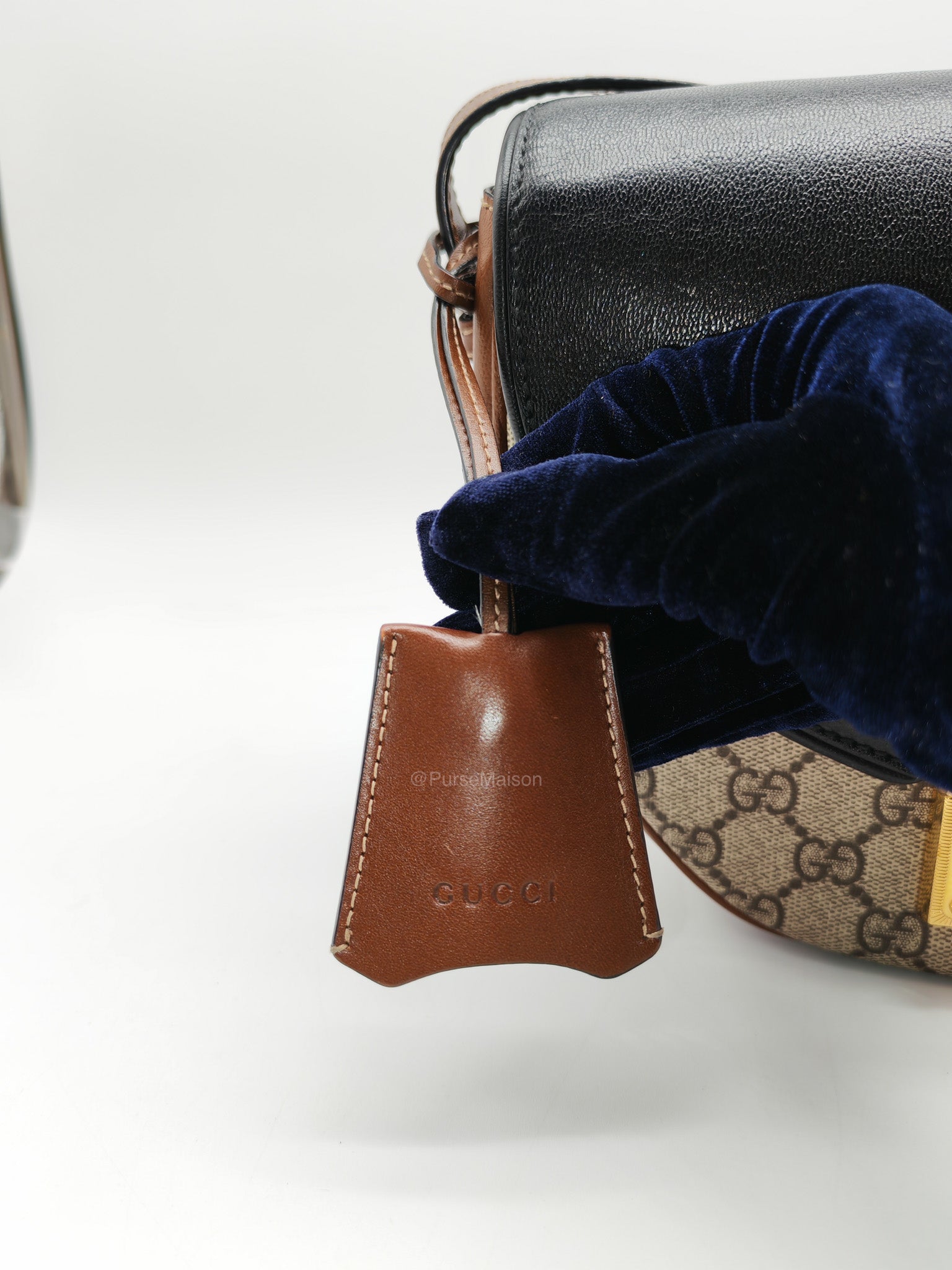 Gucci Padlock Saddle Bag in GG Supreme Monogram Canvas and Gold Hardware