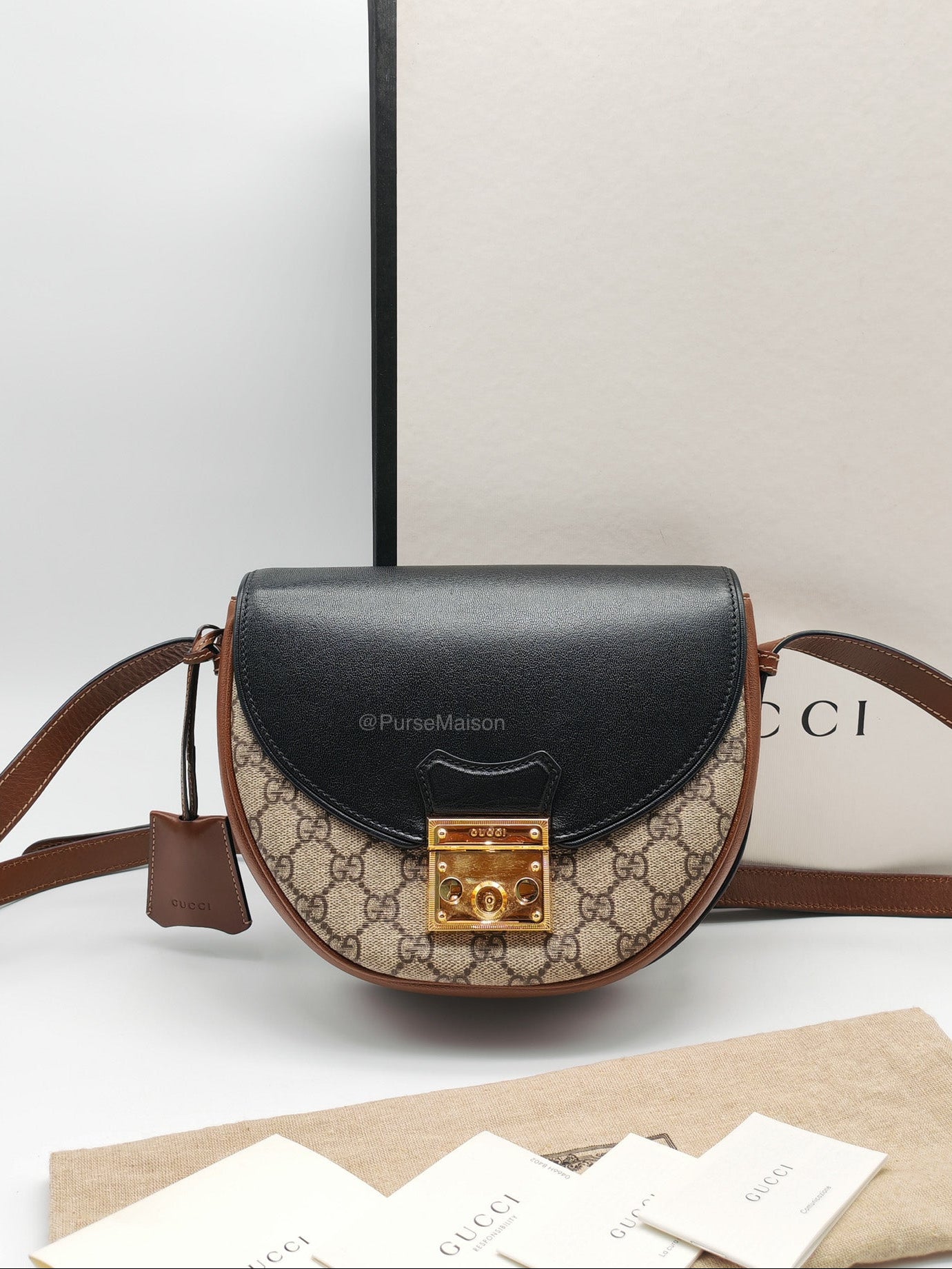 Gucci Padlock Saddle Bag in GG Supreme Monogram Canvas and Gold Hardware