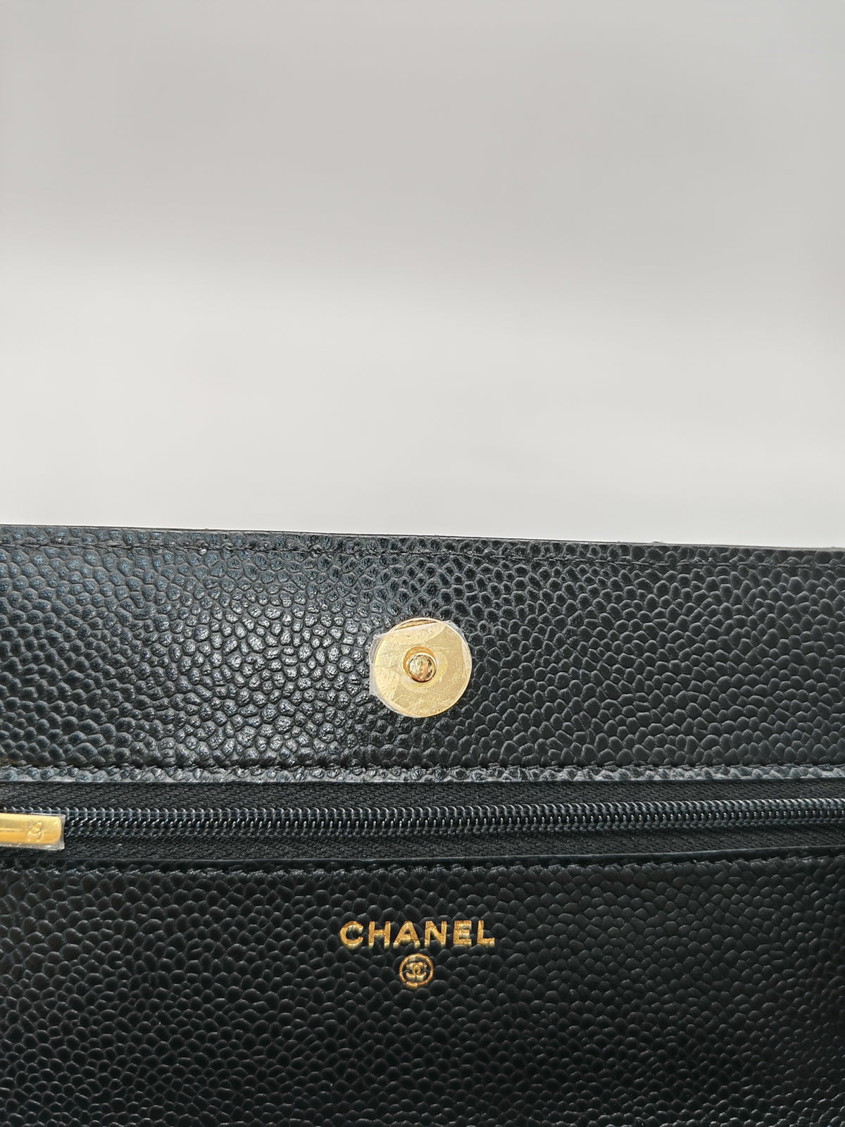 Chanel Classic Wallet On Chain (WOC) in Black Caviar Leather and Gold Hardware Microchip (2024)