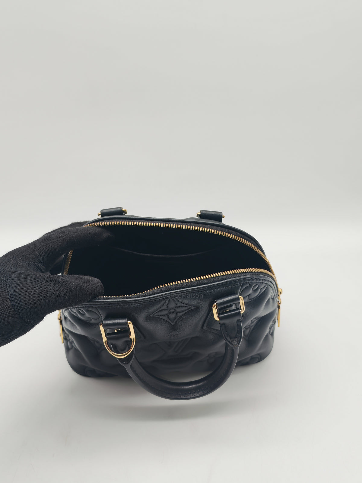 Louis Vuitton Alma BB in Black Bubblegram Quilted Calfskin Leather and Gold Hardware Microchip