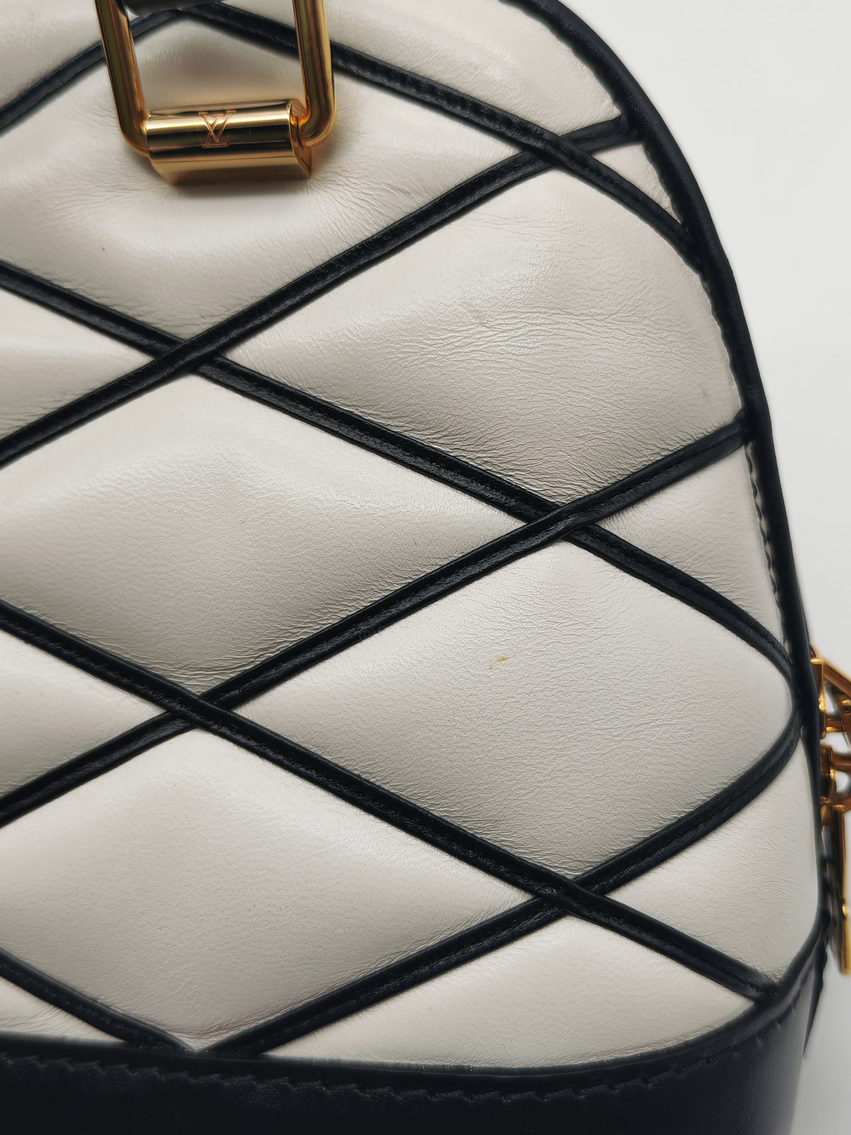 Louis Vuitton Alma BB in Malletage White and Black Lambskin Leather Gold Hardware Microchip