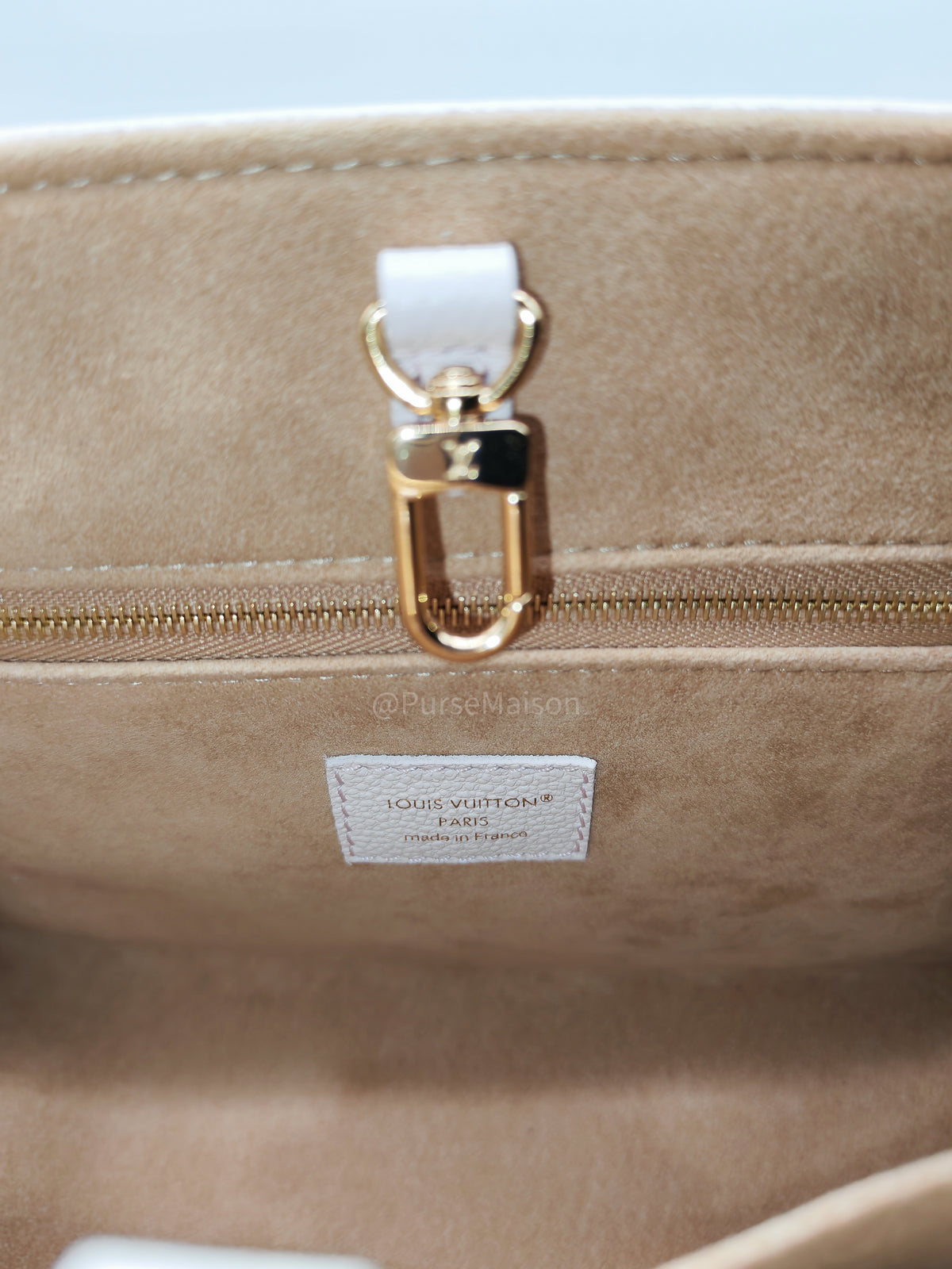 Louis Vuitton OnTheGo PM in Pale Pink Monogram Empreinte Couture Cowhide Leather and Gold Hardware Microchip
