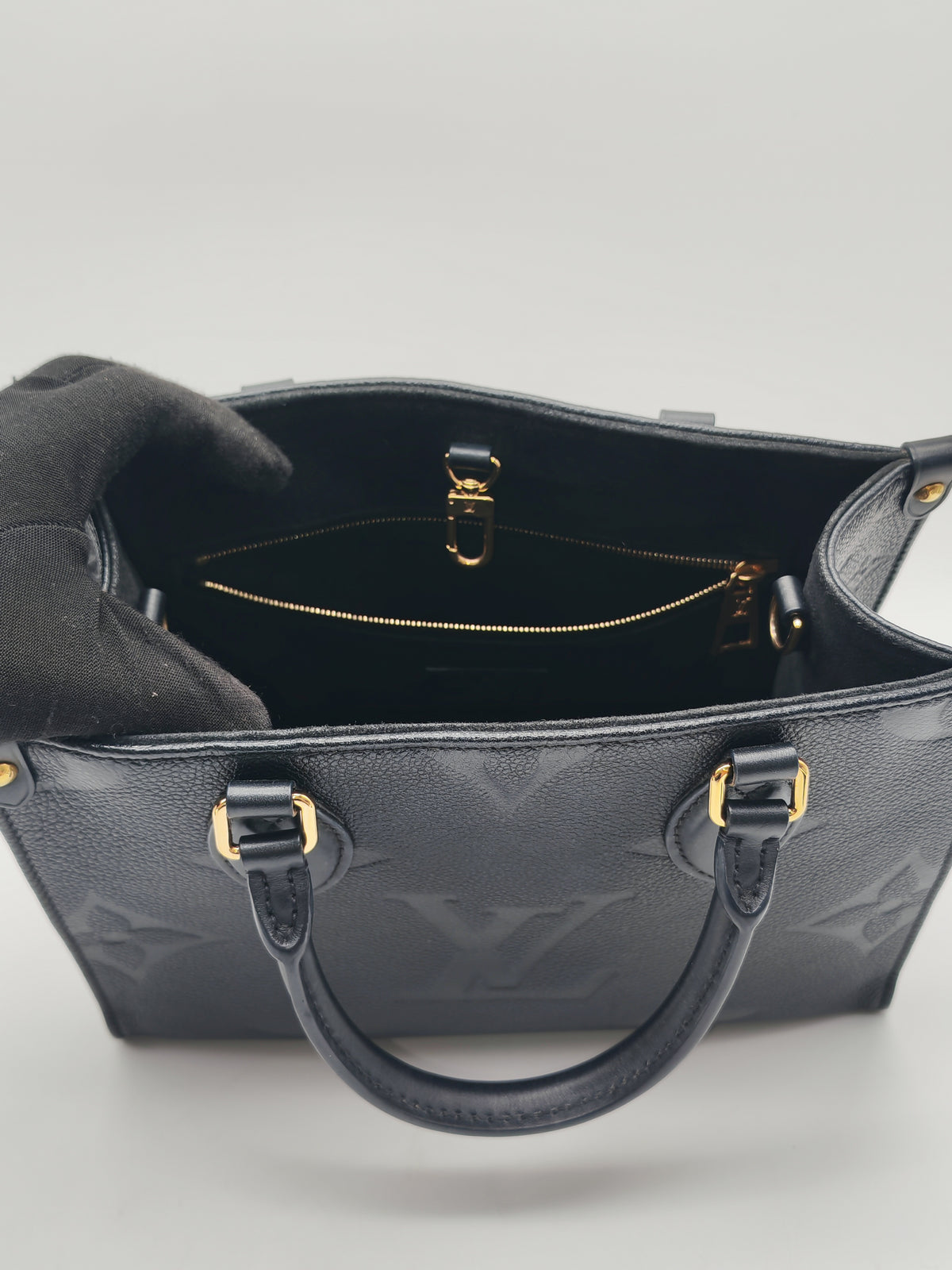 Louis Vuitton OntheGo MM In Black Monogram Empreinte Leather and Gold Hardware Microchip