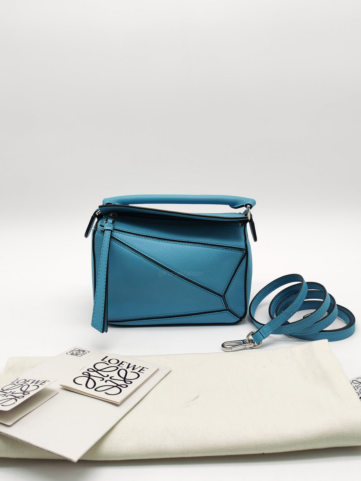 Loewe Mini Puzzle Bag in Light Blue Calfskin Leather and Silver Hardware