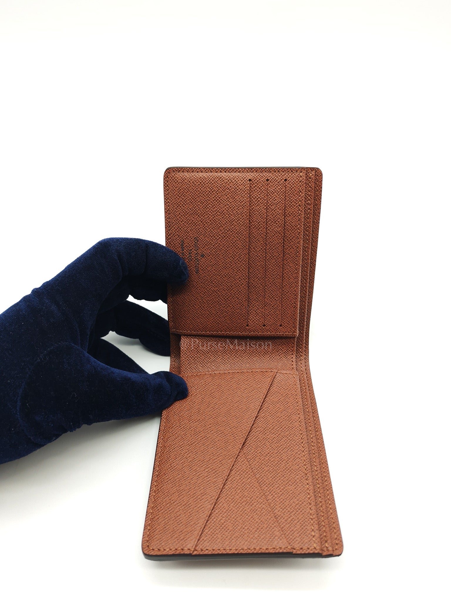 Louis Vuitton Bi-Fold Multiple Wallet in Monogram Canvas