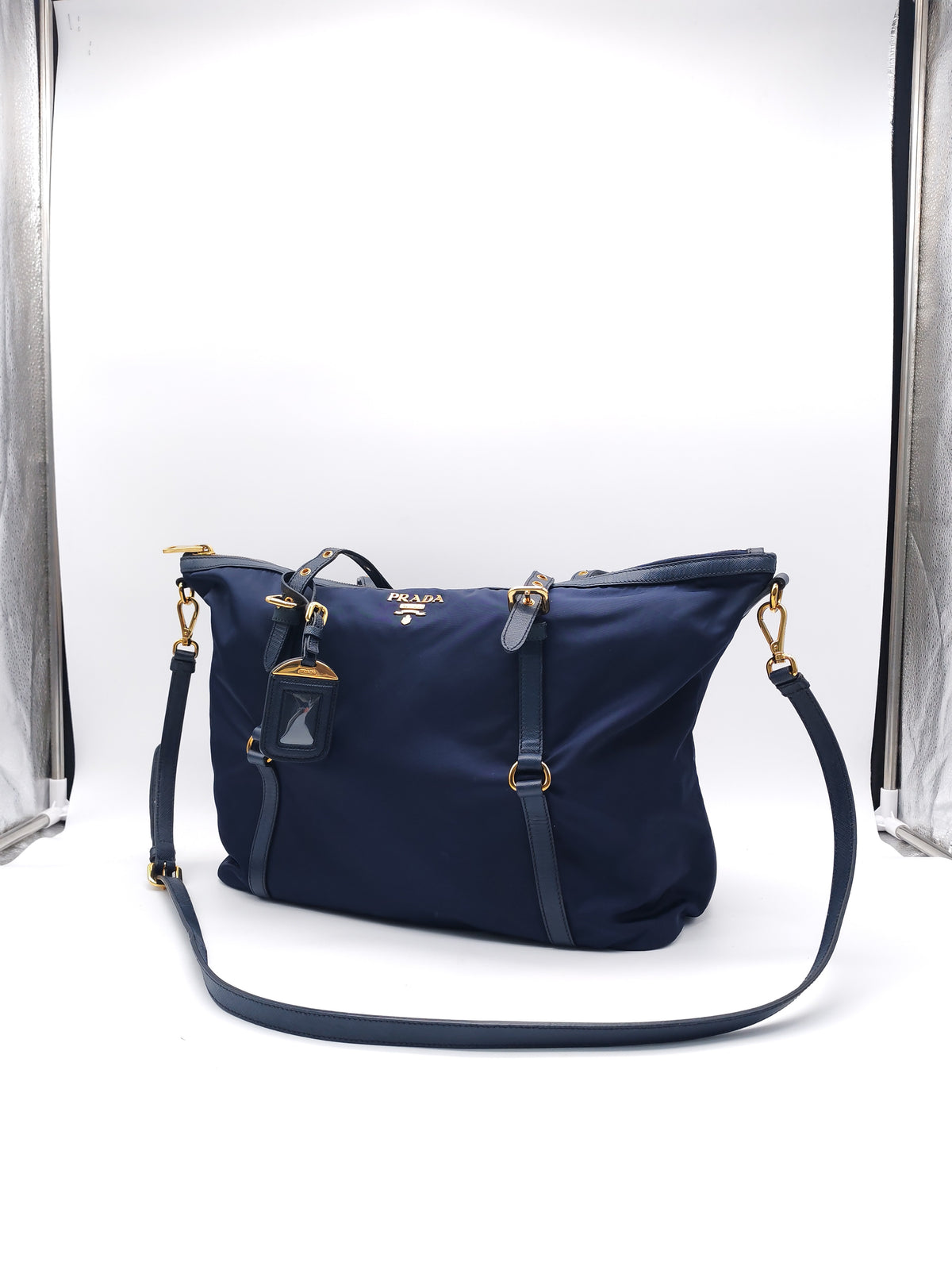 PRADA TESSUTO NYLON AND SAFFIANO HAND BAG IN NAVY BLUE