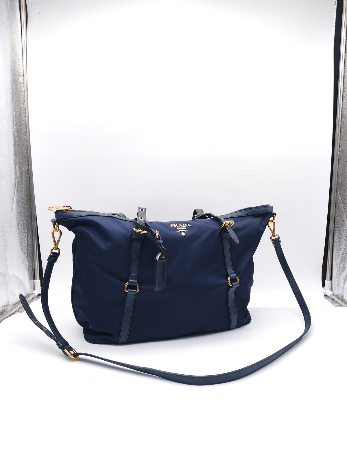 PRADA TESSUTO NYLON AND SAFFIANO HAND BAG IN NAVY BLUE