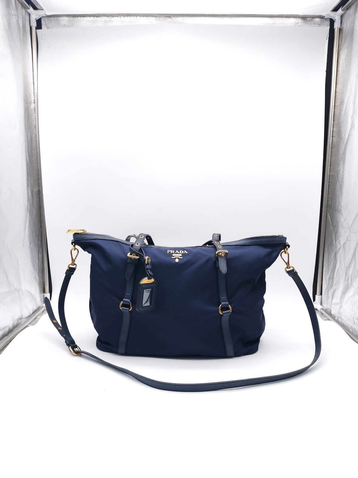 PRADA TESSUTO NYLON AND SAFFIANO HAND BAG IN NAVY BLUE