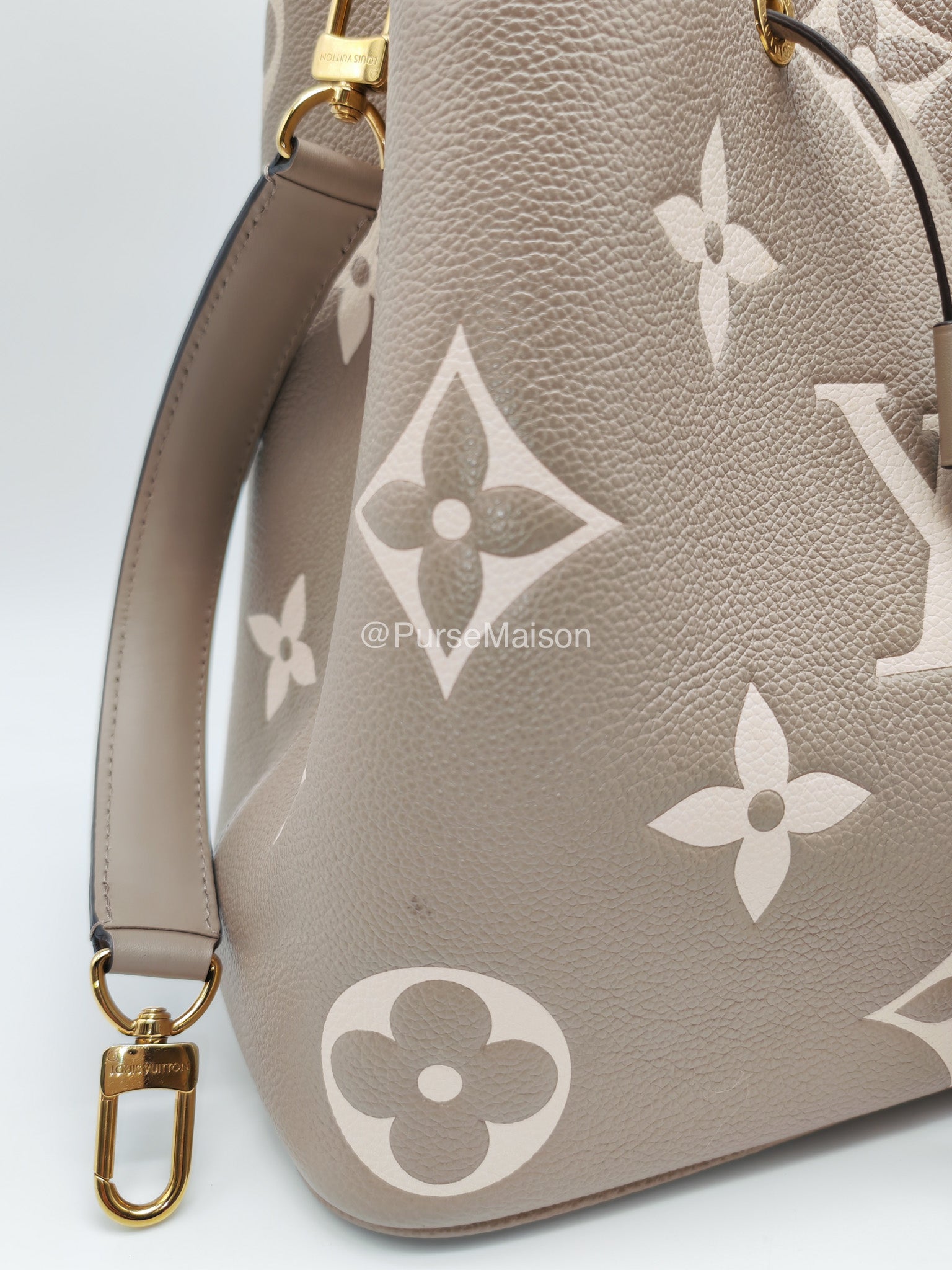 Louis Vuitton Neo Noe MM in Bicolor Monogram Tourterelle Empreinte Leather (Microchip)