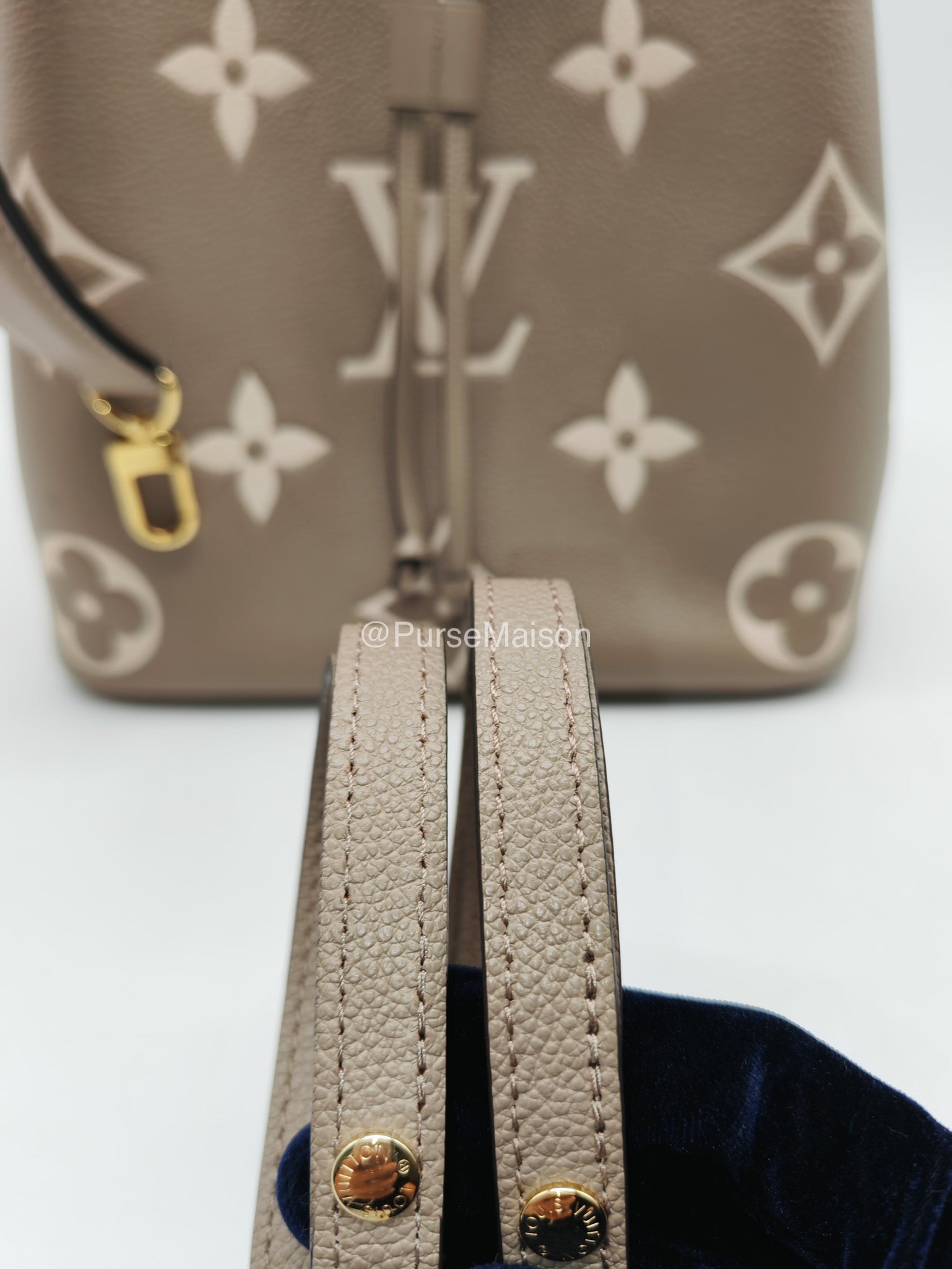 Louis Vuitton Neo Noe MM in Bicolor Monogram Tourterelle Empreinte Leather (Microchip)