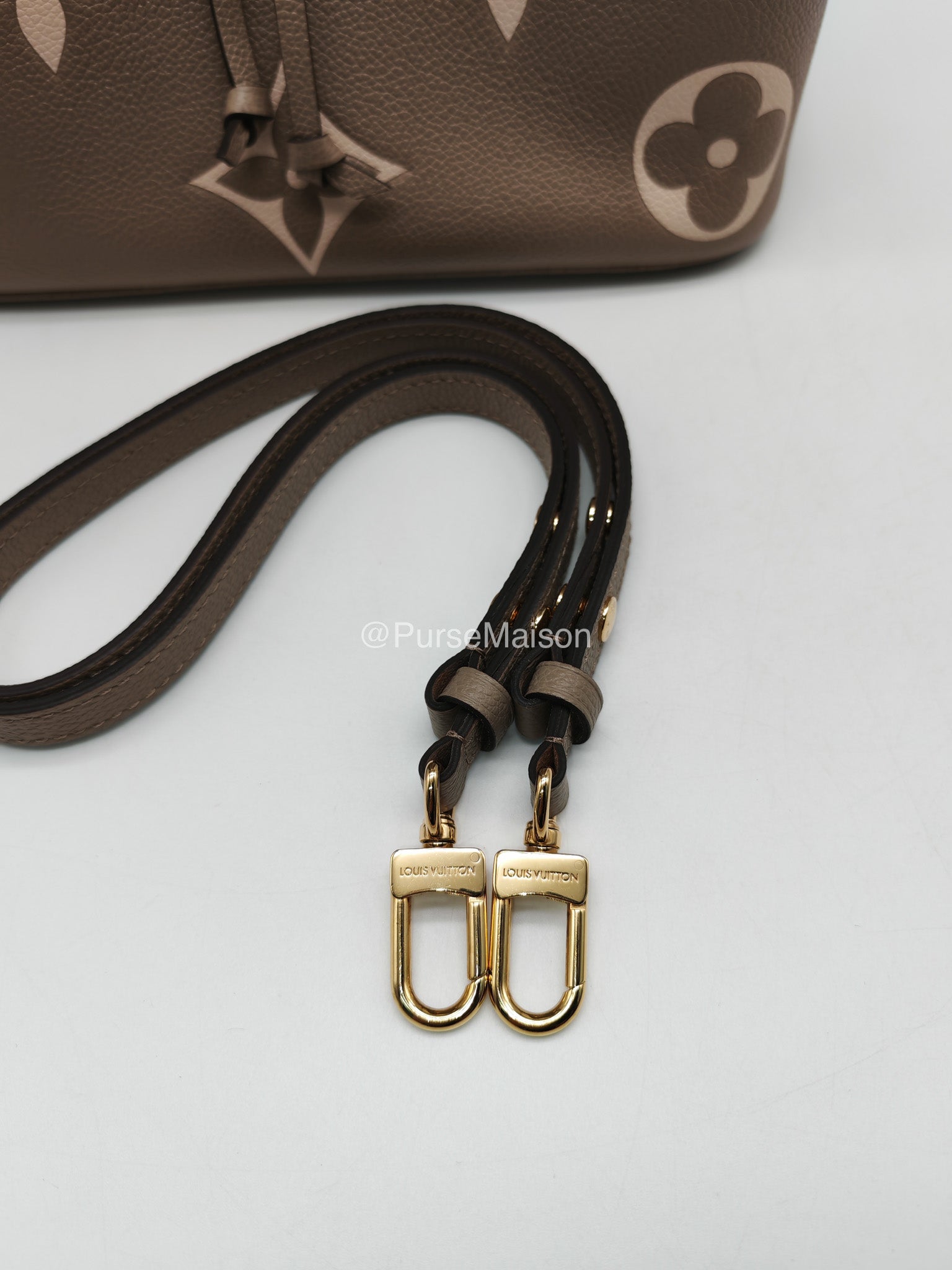 Louis Vuitton Neo Noe MM in Bicolor Monogram Tourterelle Empreinte Leather (Microchip)