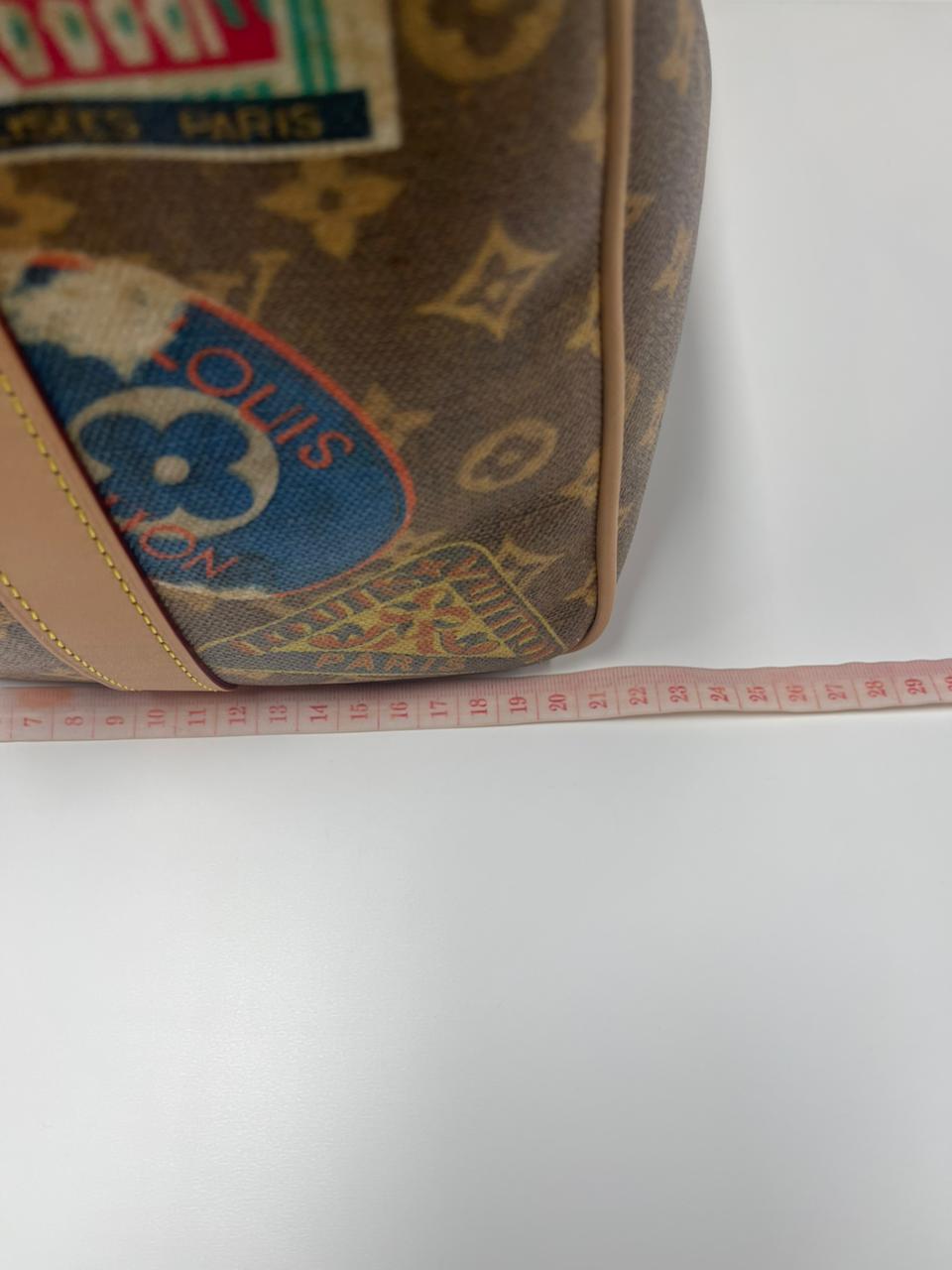 Louis Vuitton Keepall Bandouliere Flight Mode Collection in Monogram Canvas Cowhide Leather and Gold Hardware Microchip