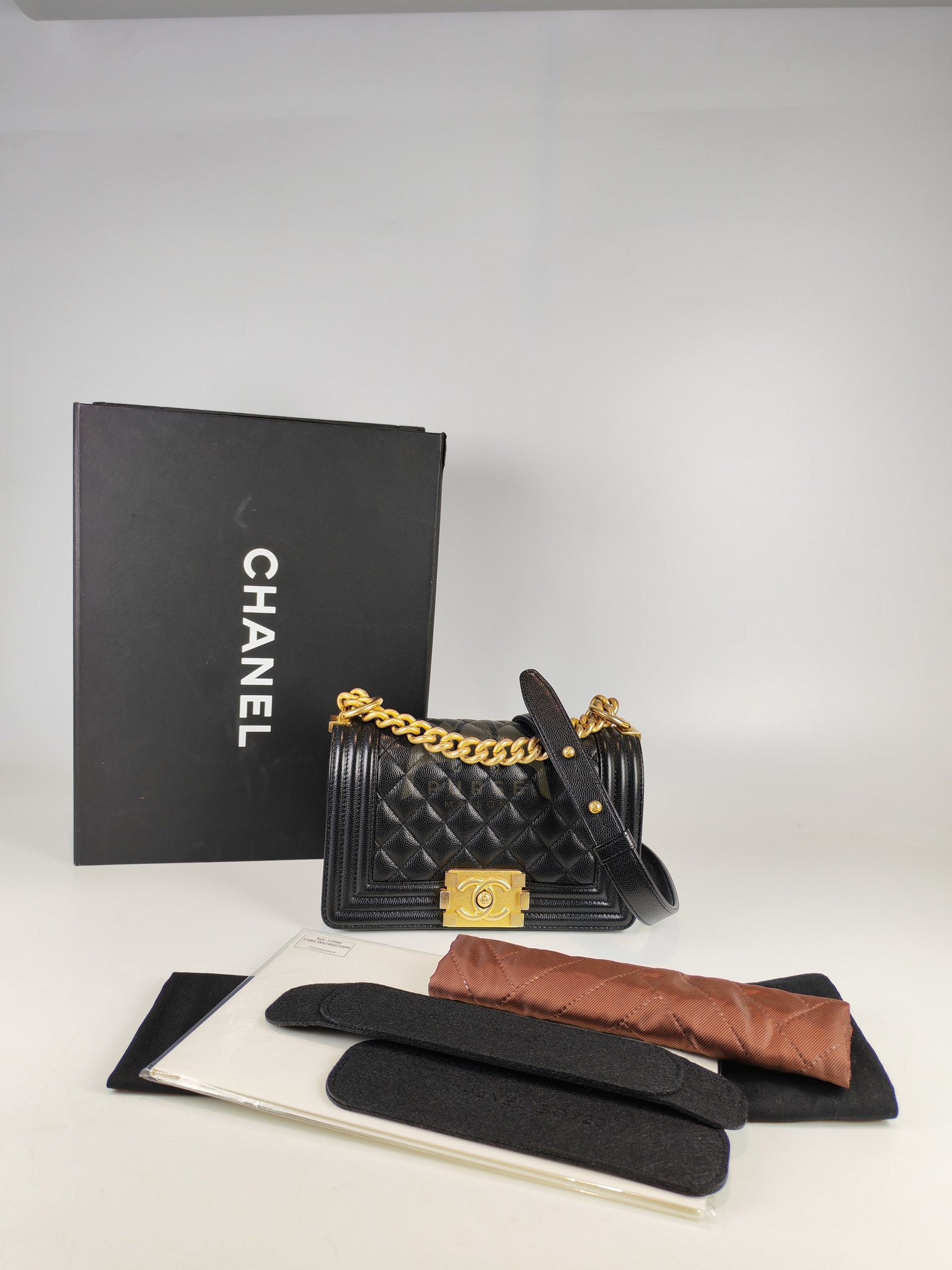 Boy Small in Black Caviar Leather & Age Gold Hardware Microchip | Purse Maison Luxury Bags Shop