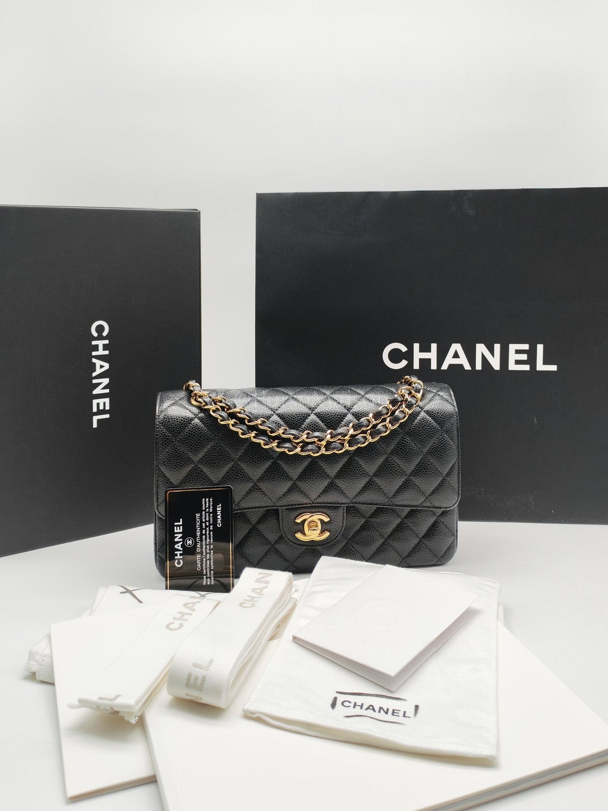 Chanel Classic Double Flap Medium in Black Caviar Leather Gold Hardware (Series 30)