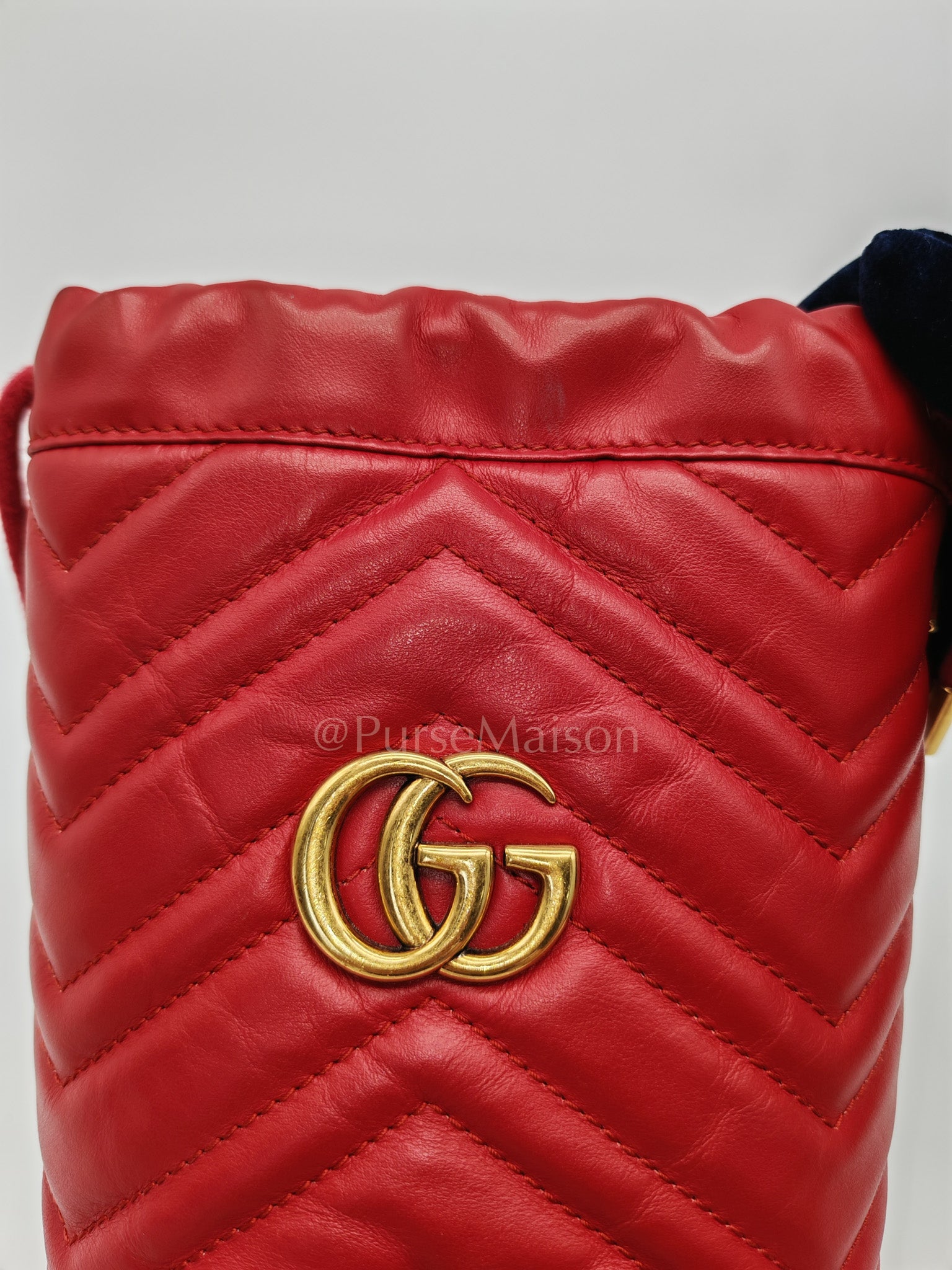GG Mini Bucket Bag in Red Marmont Matelasse Leather