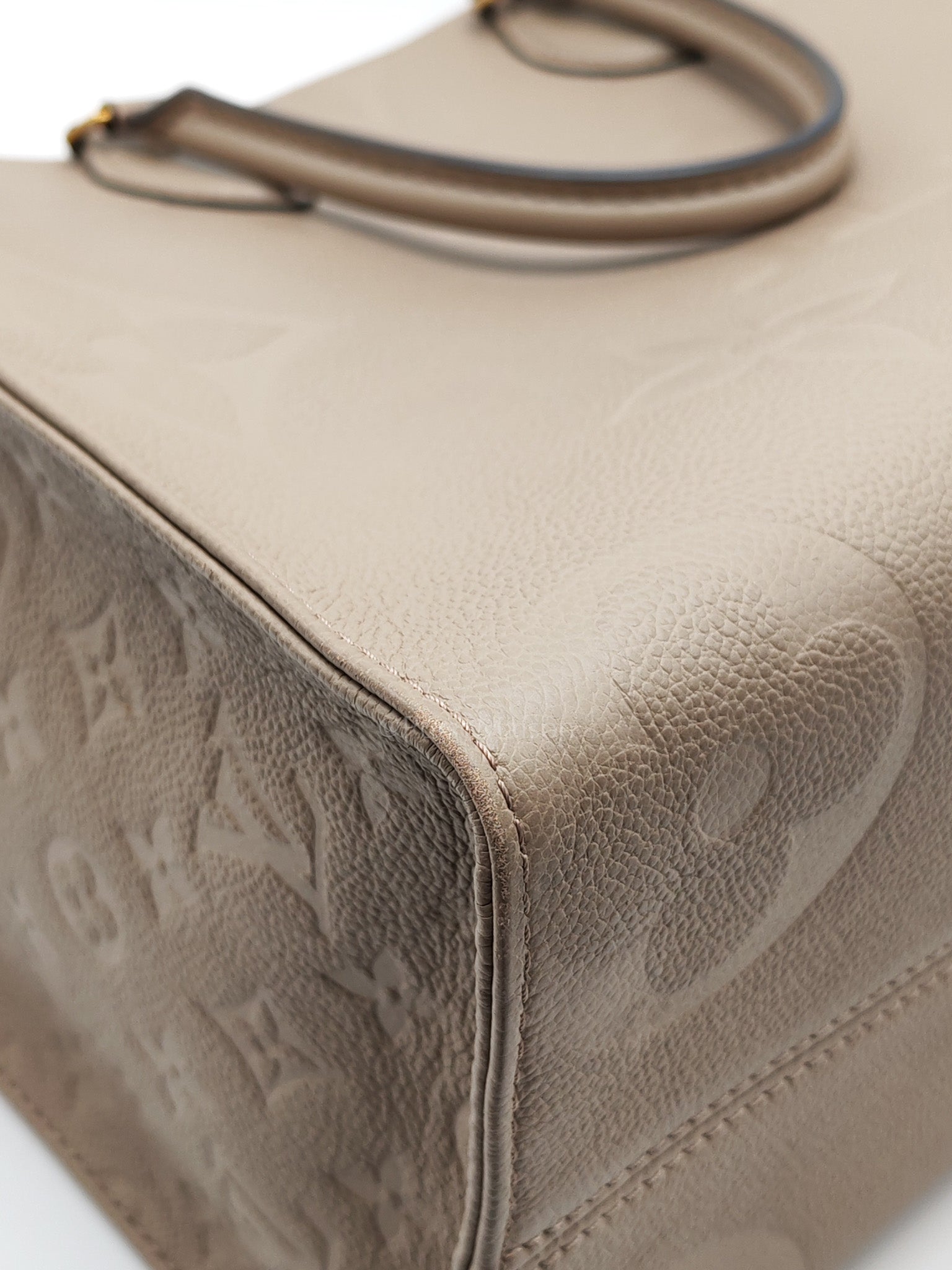 OnTheGo MM (OTG) in Beige Monogram Empriente Leather & Gold Hardware Microchip