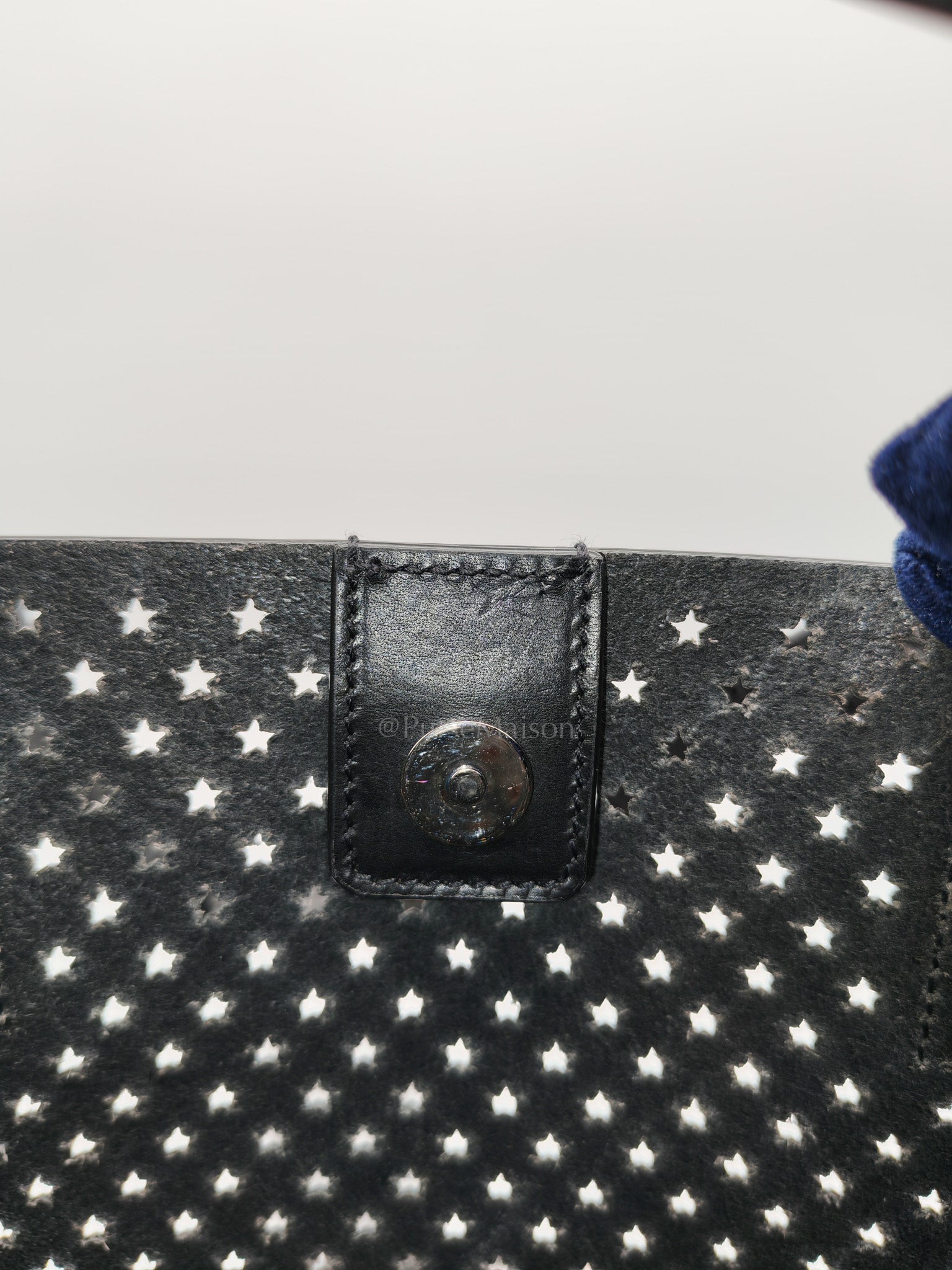 Perforated Star in Black Calfskin Leather Crossbody Bag