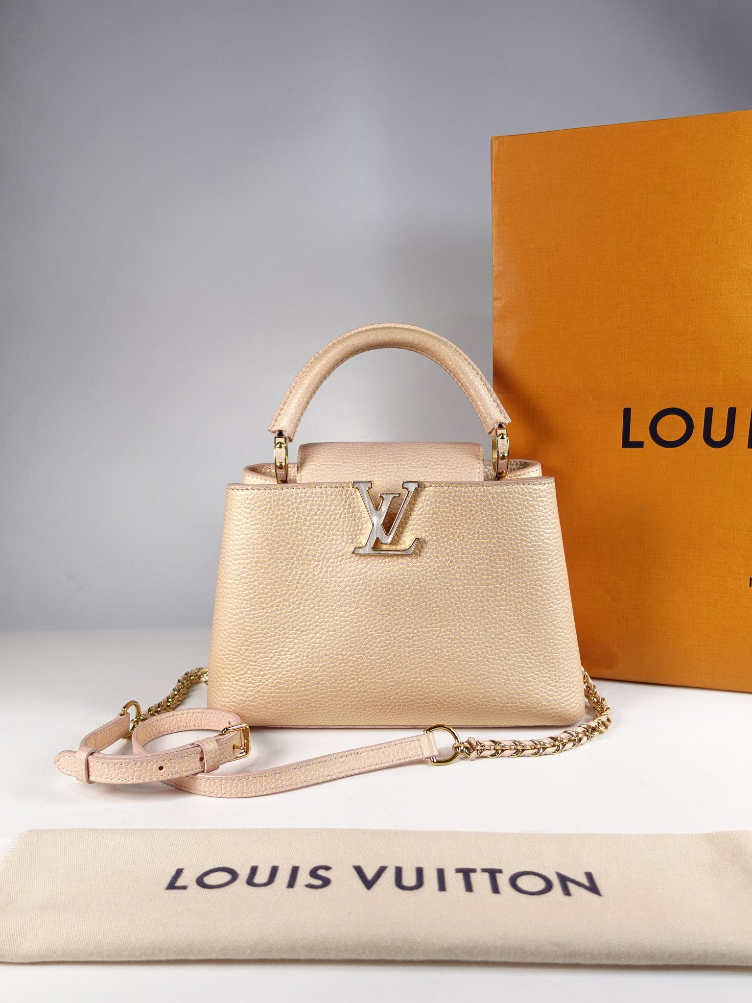 Capucines BB in Peach Mother of Pearl Taurillon Leather | Purse Maison Luxury Bags Shop