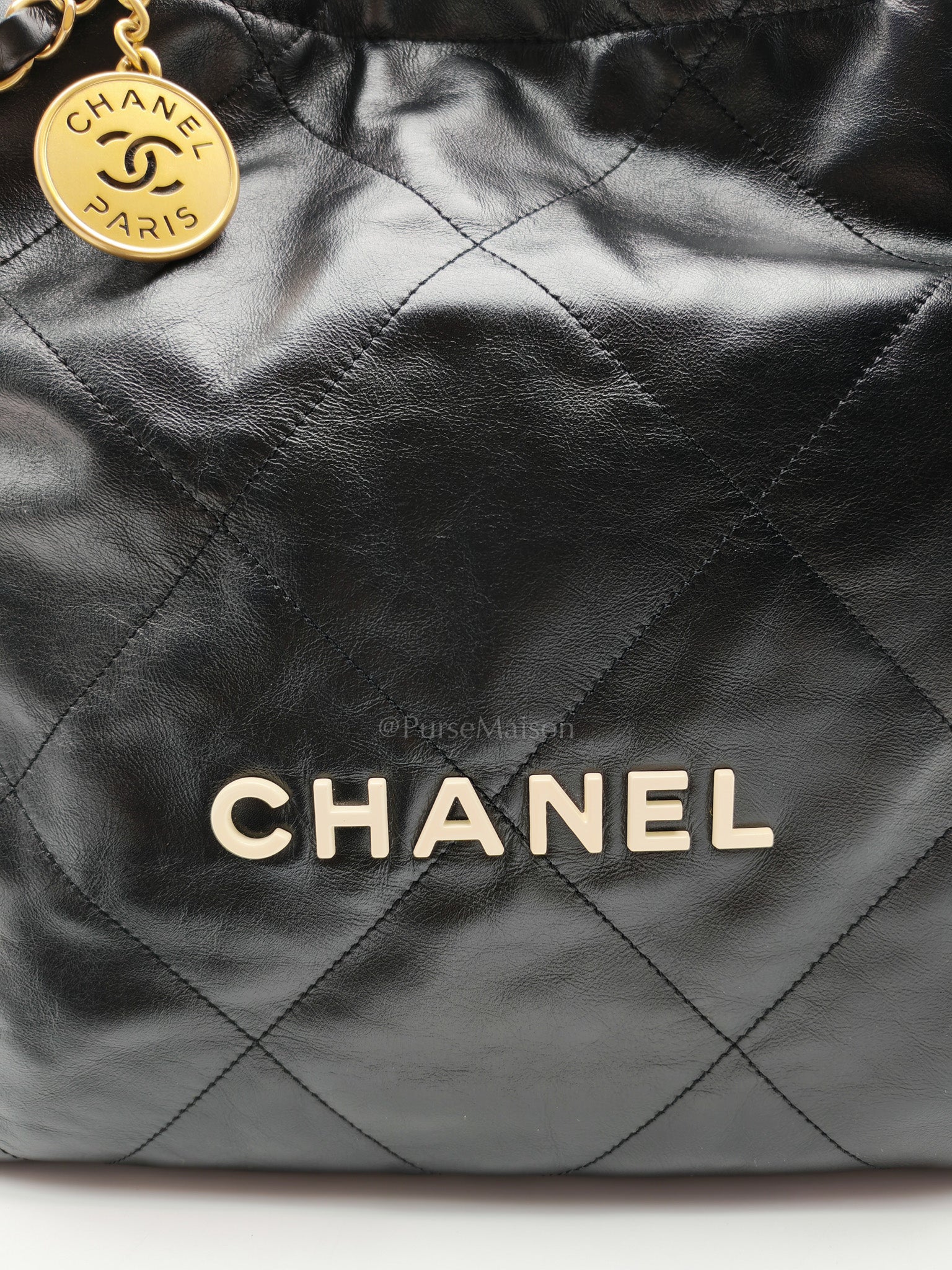 22 Medium in Black Quilted Goatskin Leather and Aged Gold Hardware (Microchip) | Purse Maison Luxury Bags Shop