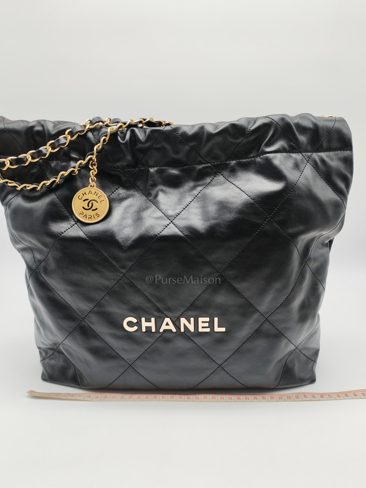 22 Medium in Black Quilted Goatskin Leather and Aged Gold Hardware (Microchip) | Purse Maison Luxury Bags Shop