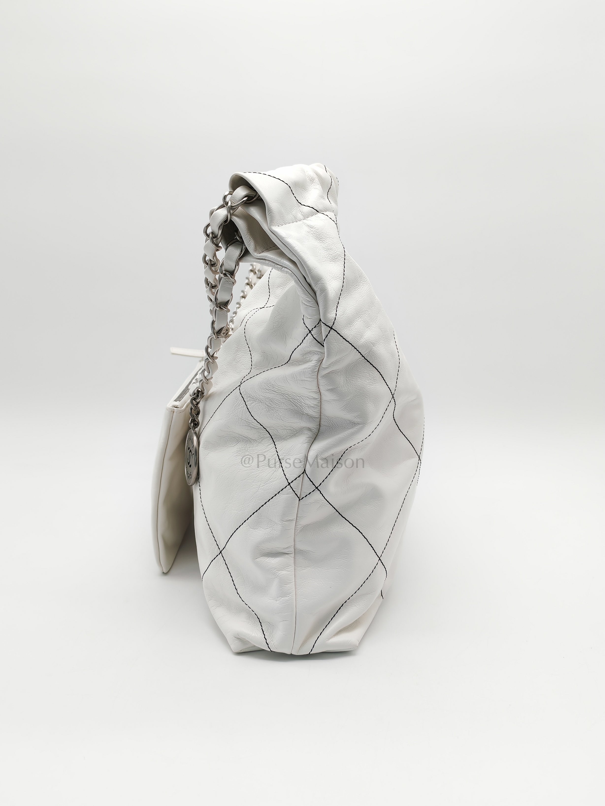 22 in White Quilted Calfskin Leather & Silver Hardware Microchip | Purse Maison Luxury Bags Shop