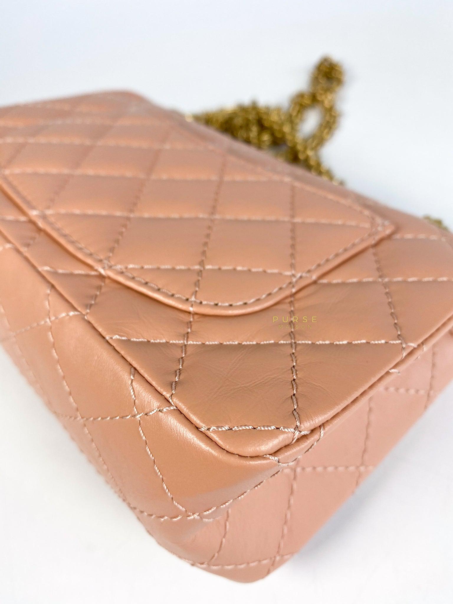 Chanel 2.55 Mini Reissue Salmon distressed calfskin & Aged Gold Hardware (Microchip)