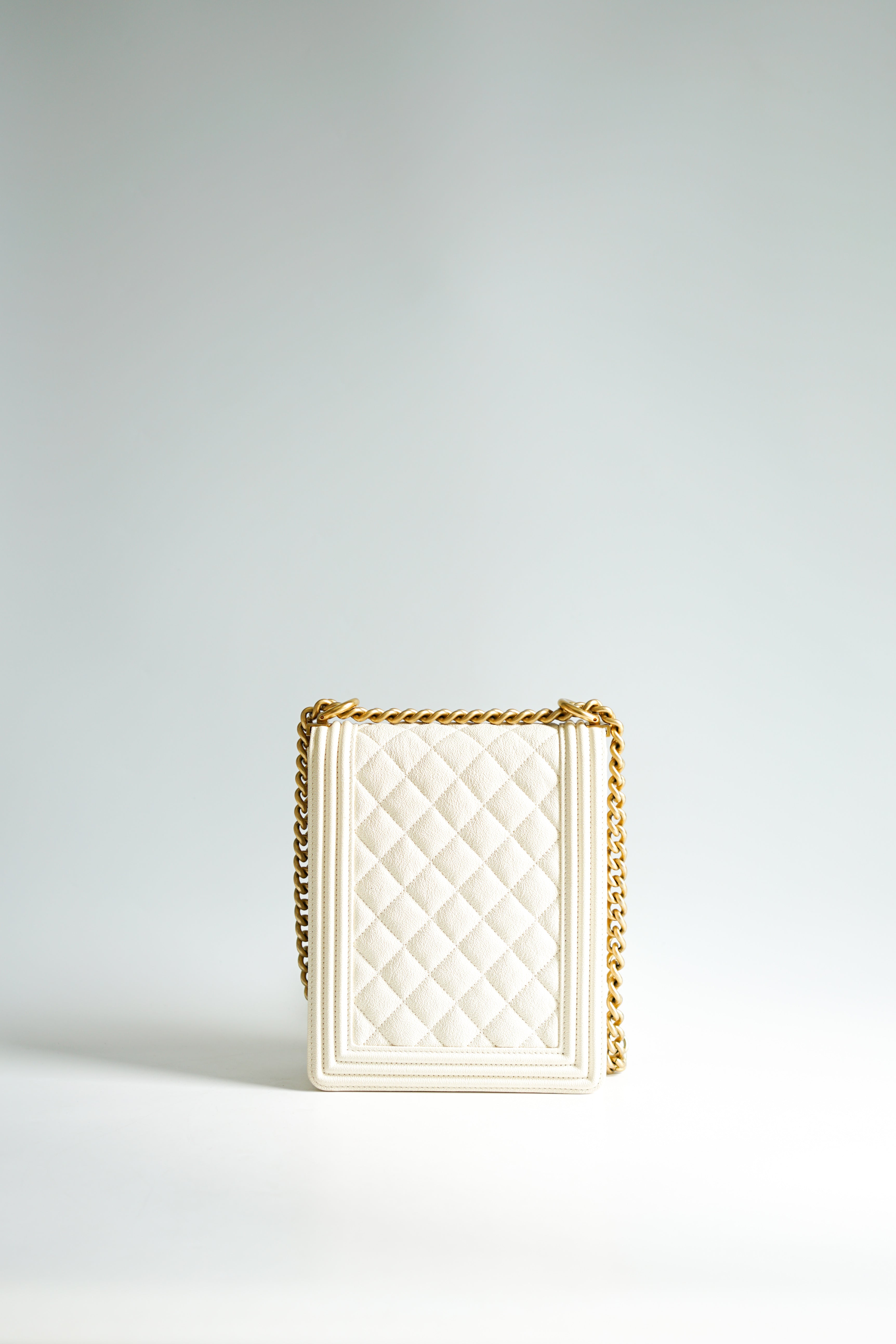 Chanel Cruise Boy North South in White Caviar Leather and Aged Gold Hardware Series 26