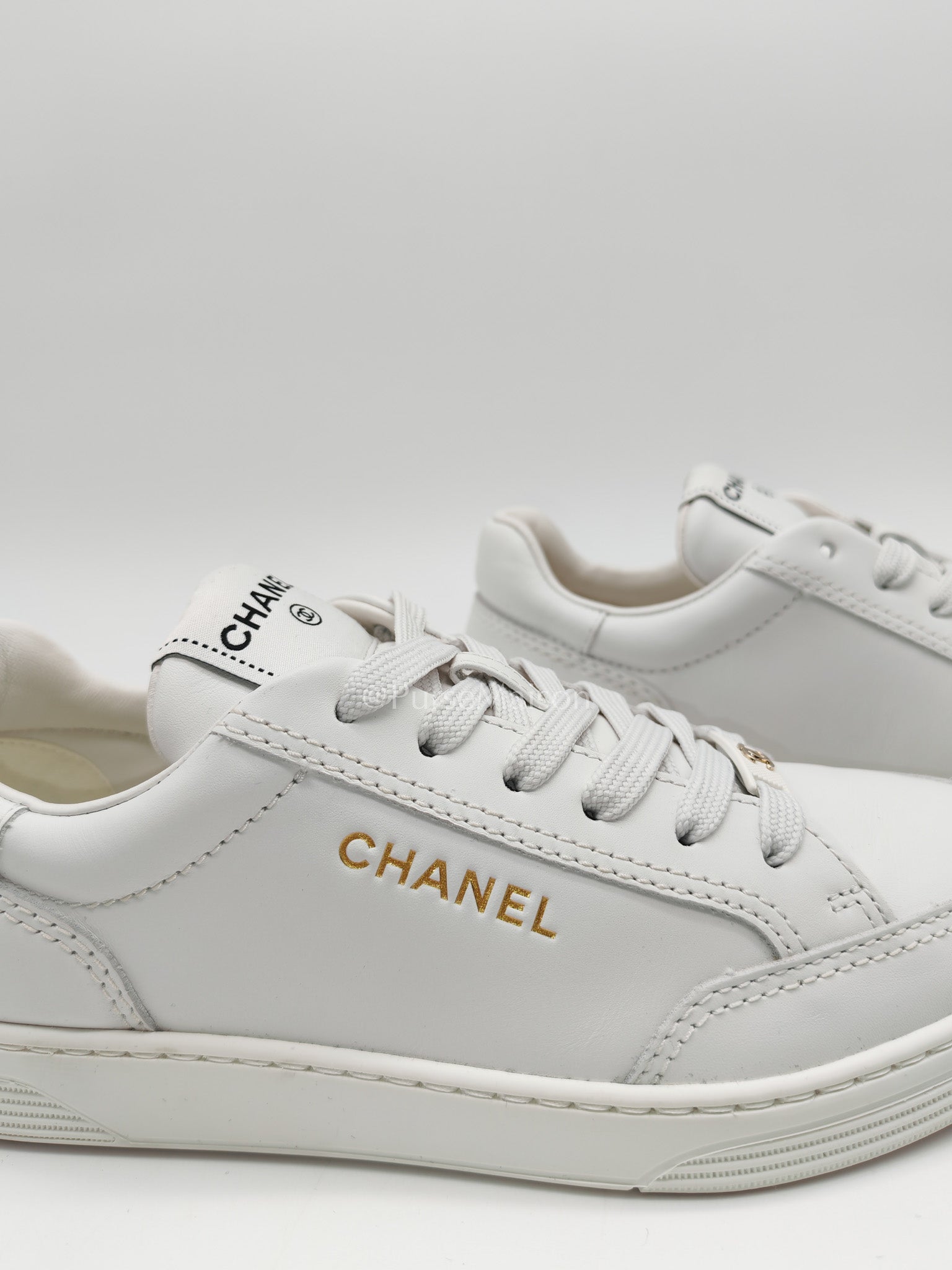 Chanel Low Top CC Logo Sneakers in White Size 37.5EU (24cm) | Purse Maison Luxury Bags Shop