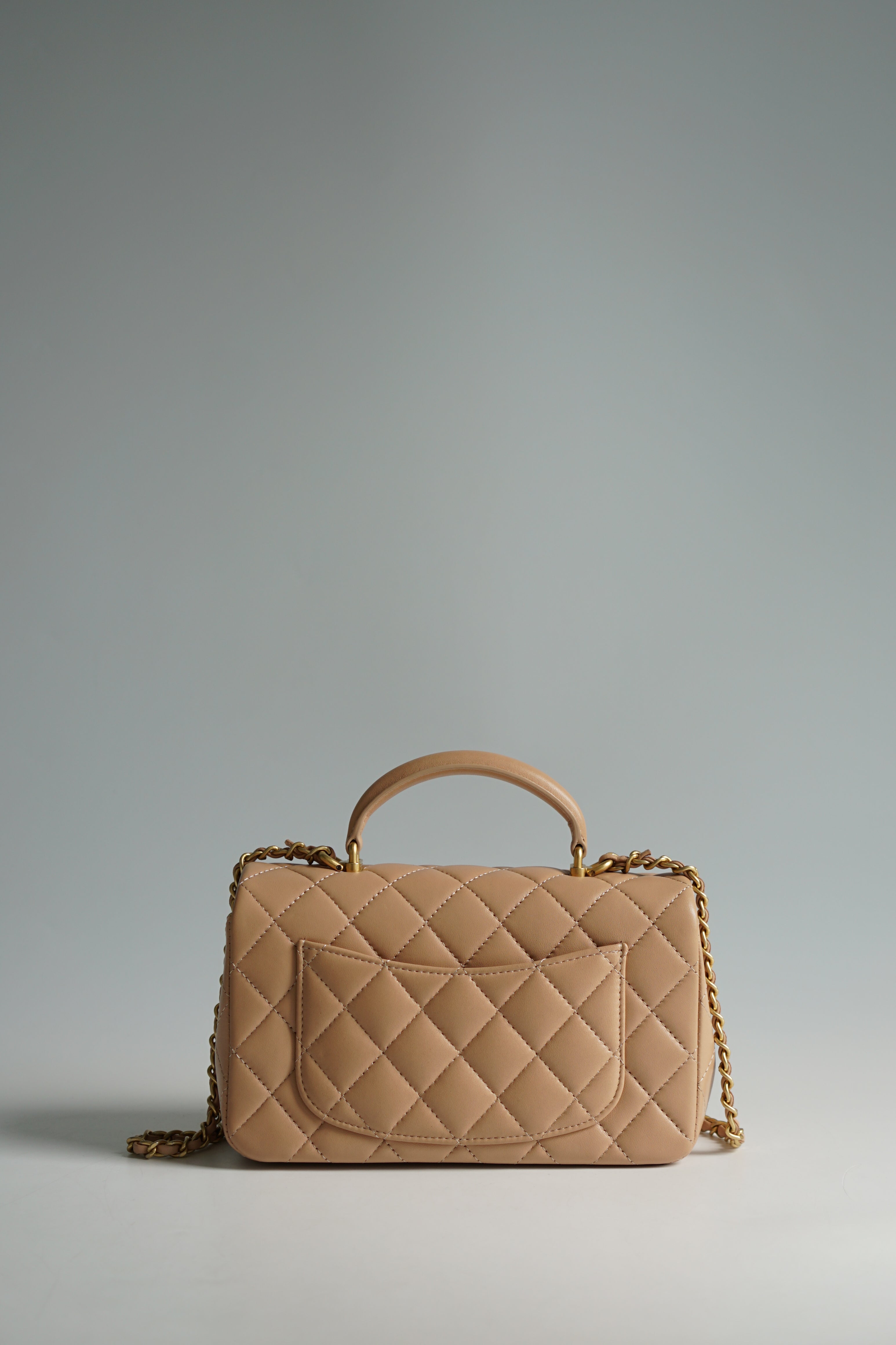 Chanel Mini Rectangle Top Handle 21A Beige Lambskin in Aged Gold Hardware (Microchip)