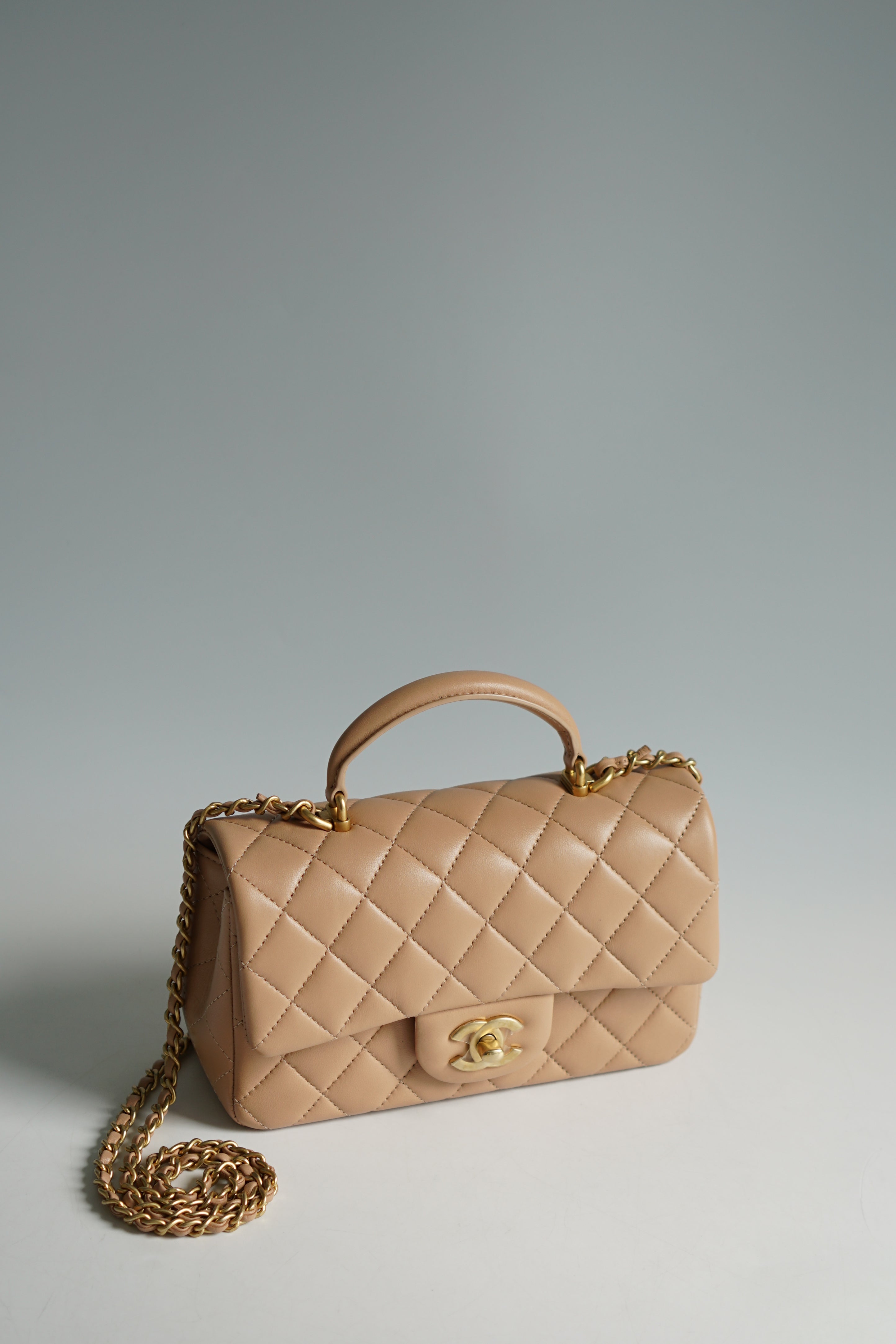 Chanel Mini Rectangle Top Handle 21A Beige Lambskin in Aged Gold Hardware (Microchip)