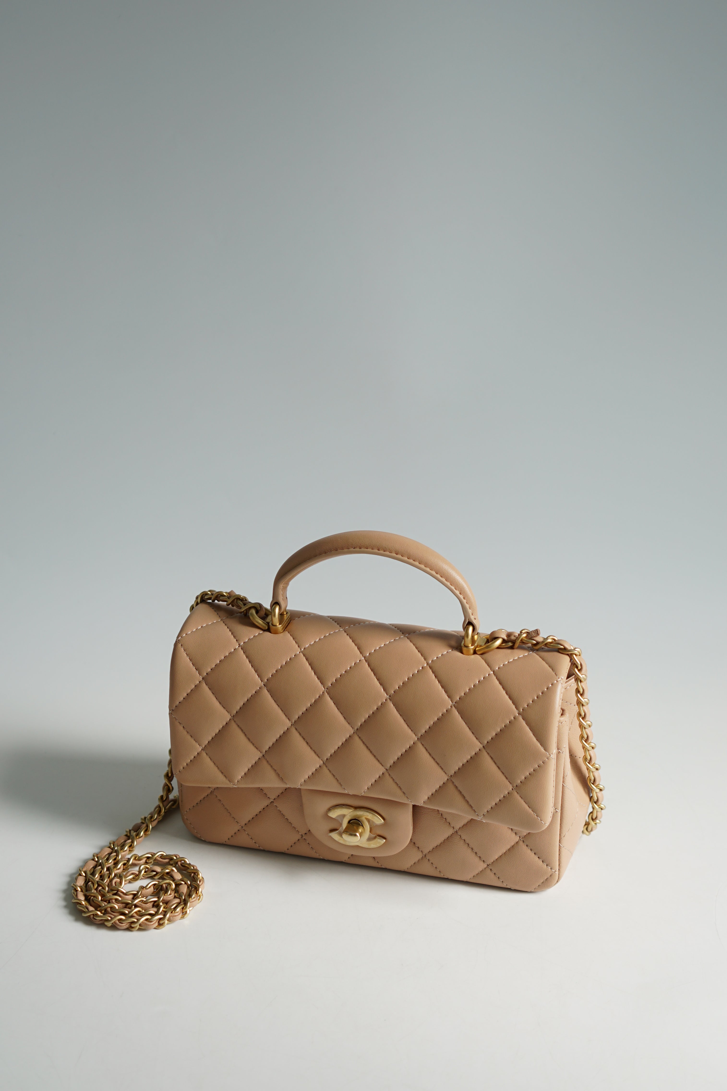 Chanel Mini Rectangle Top Handle 21A Beige Lambskin in Aged Gold Hardware (Microchip)