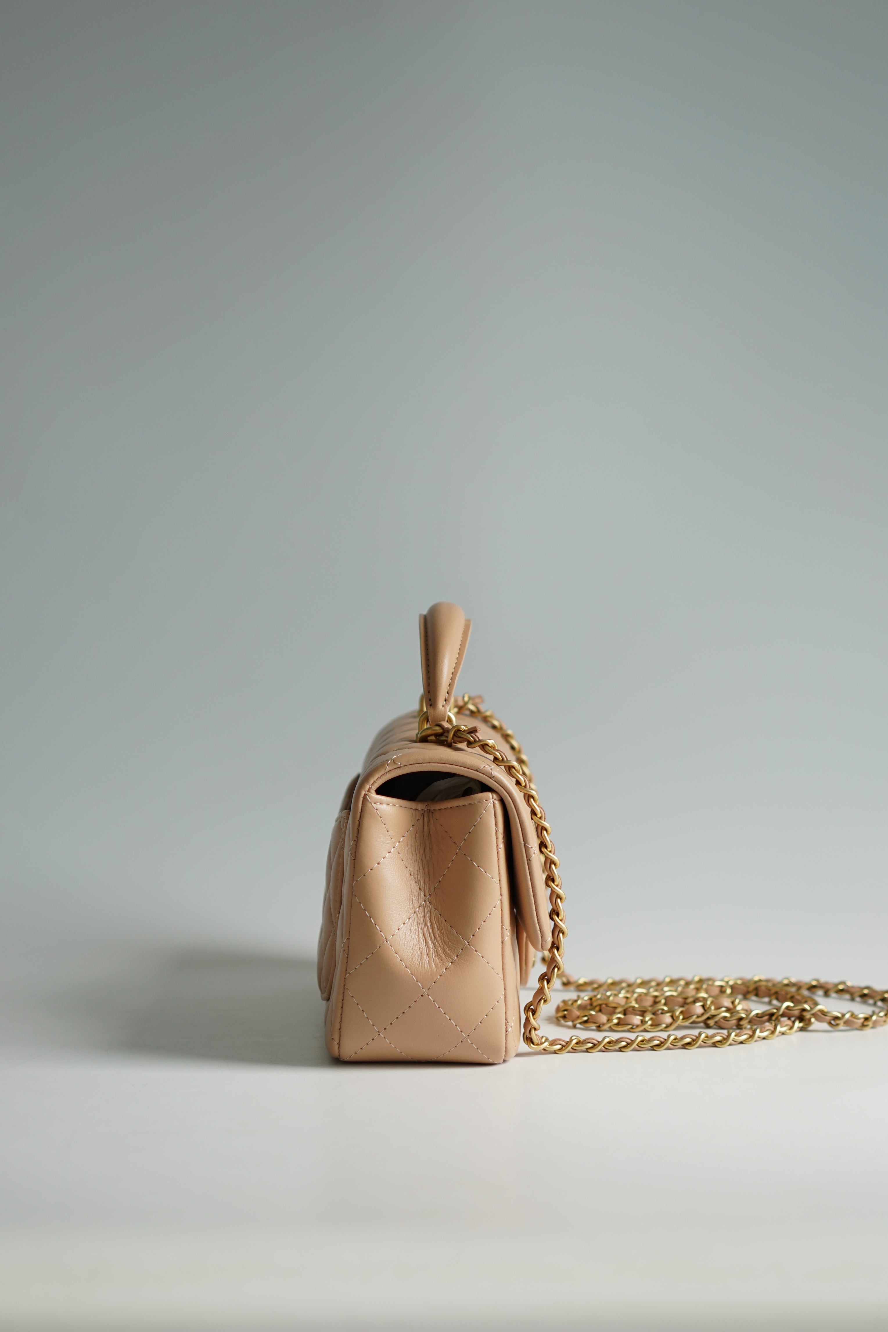 Chanel Mini Rectangle Top Handle 21A Beige Lambskin in Aged Gold Hardware (Microchip)